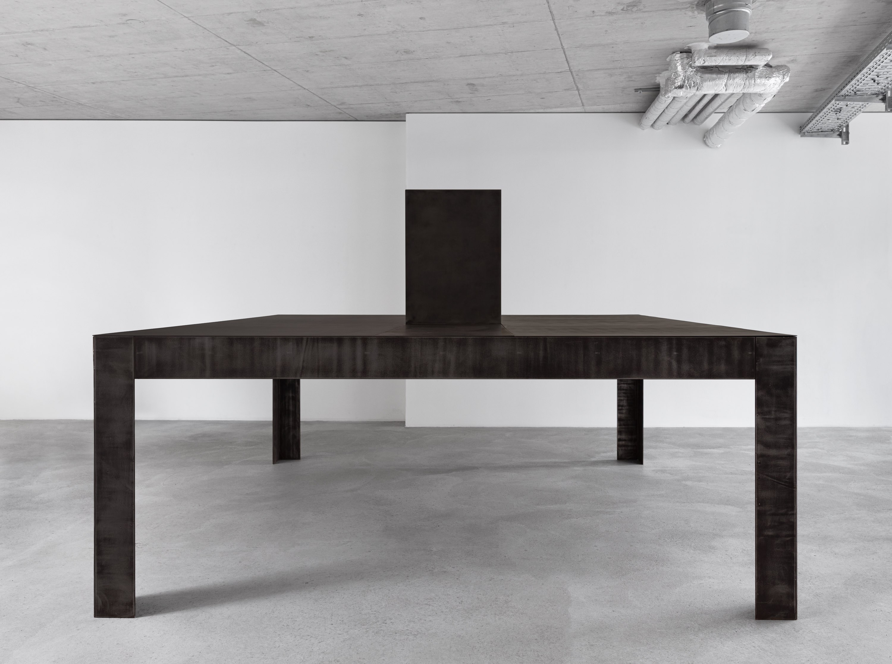 Emanuel de Carvalho, lack archive, 2025, mild steel, slate black patina, two drawings on paper, 165 × 250 cm x 250 cm