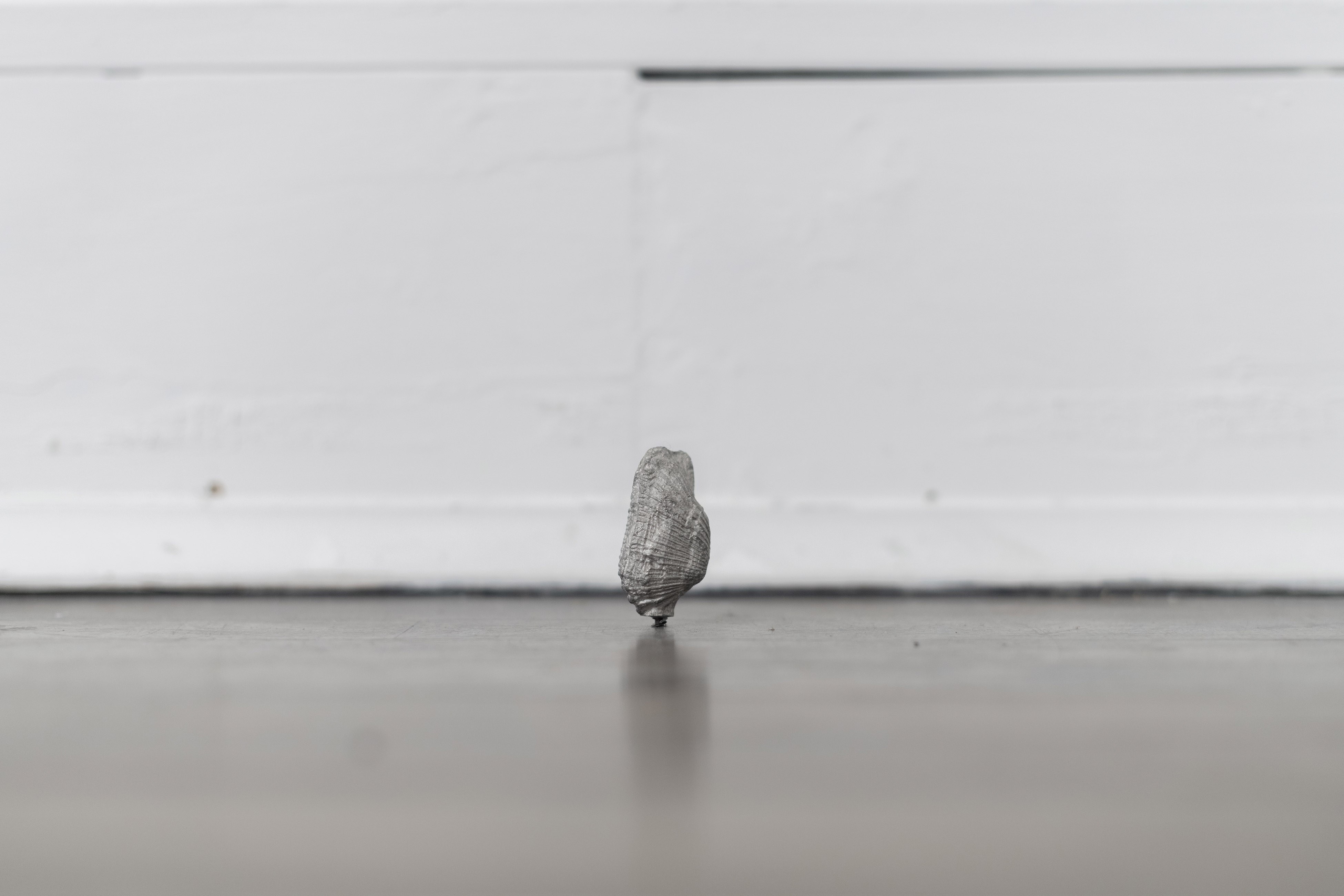 Time before time (Suolo), series, wood box, epoxy resin, wood chipboard, clay, pewter, 70 x 30 x 4 cm, 2025, courtesy of the artist and DES BAINS, London