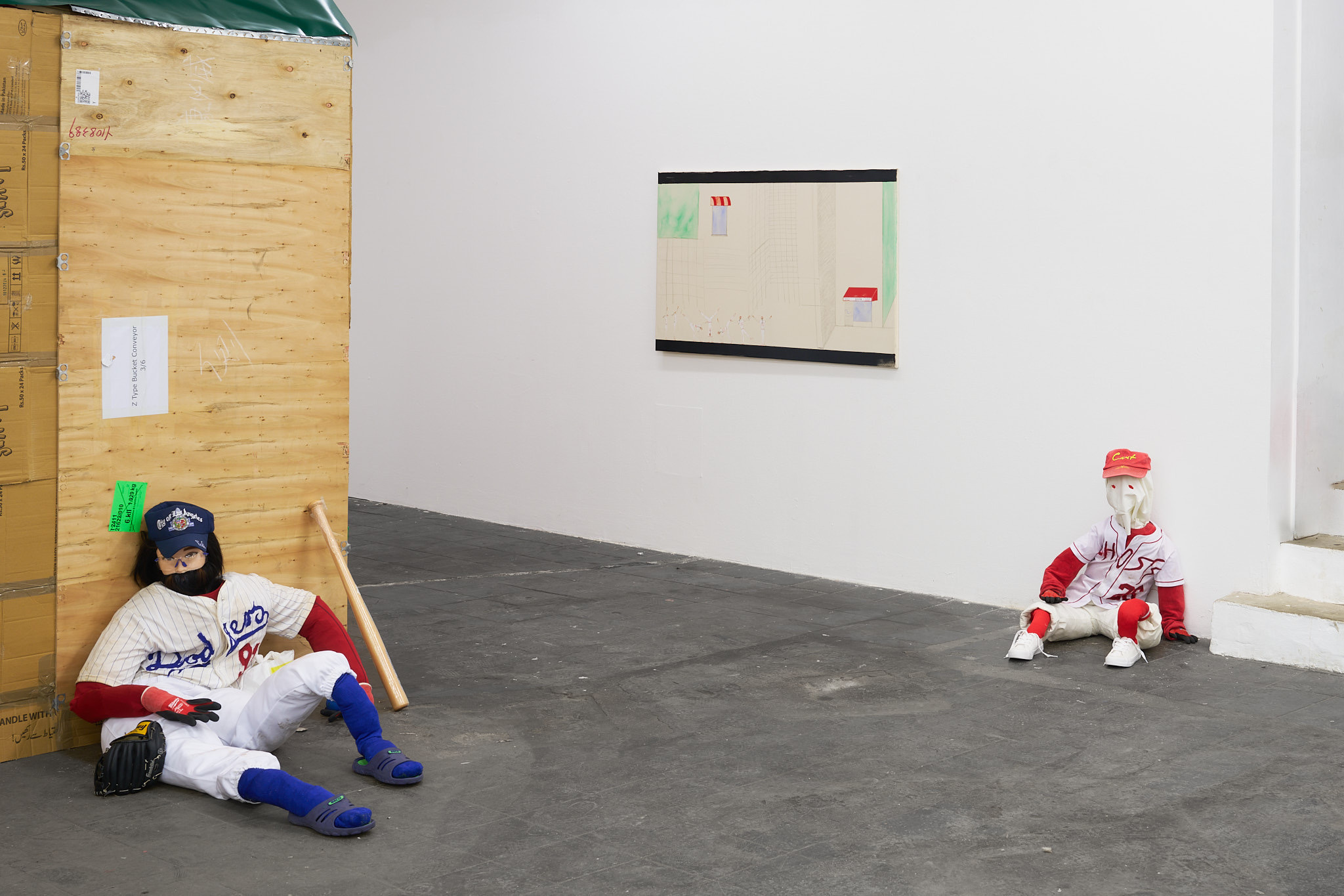 installation view, Dummy(J.HAWK 91), 2024, Dodgers Jersey Bootleg, different materials, Dummy2(Booh26), 2024, GHOSTS Jersey, different materials , Cartwheel, Kiosk,FFM (untitled),2024, acrylic paint, graphite on canvas, 77 x 160cm