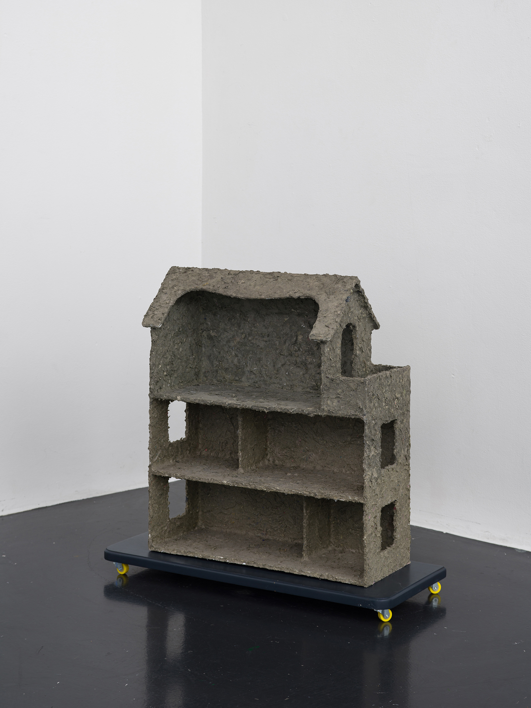 Julia Znoj, Neighborhood?, 2025, Wood, wheels, paper, glue, glass, 64 x 70 x 30 cm