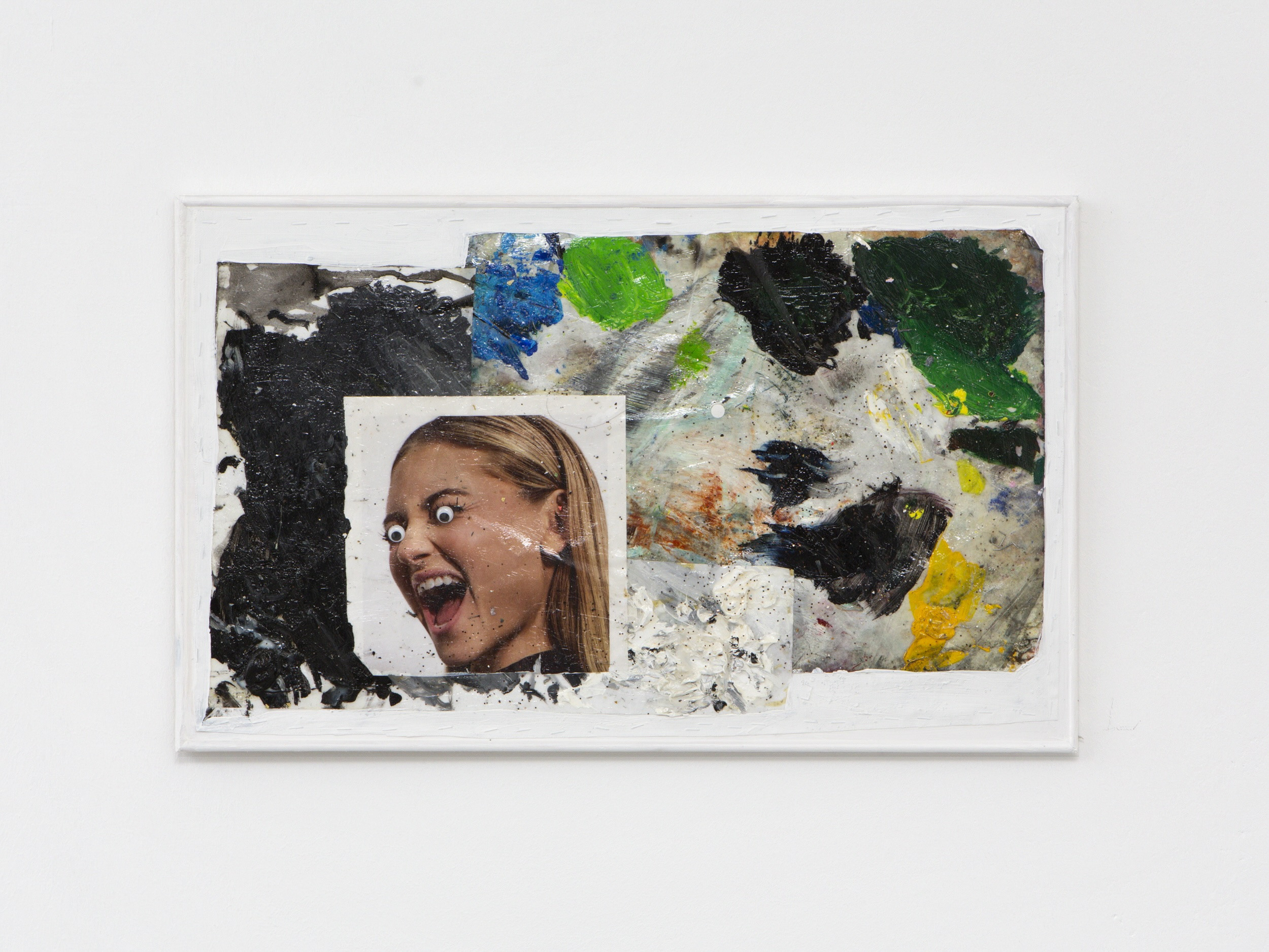 Jasmine Gregory, Protect me from what I don’t want no.2, 2025.Oil, palettes, magazine, plastic, acrylic, linen on wooden stretchers. 40 × 75 cm.