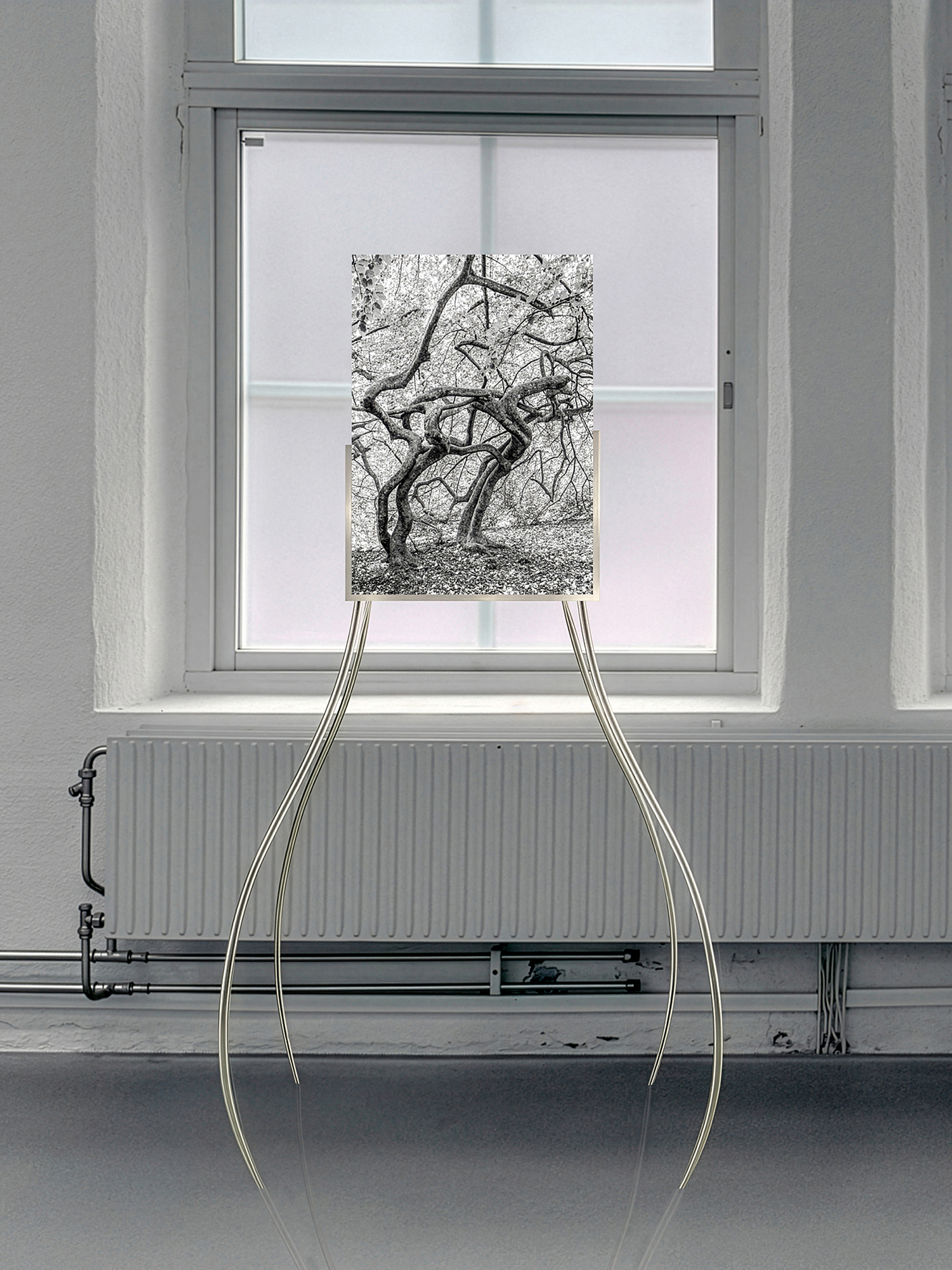 Susanne Fagerlund, "Twisted #2", 2025. UV-print on Plexiglas and aluminium stand.  