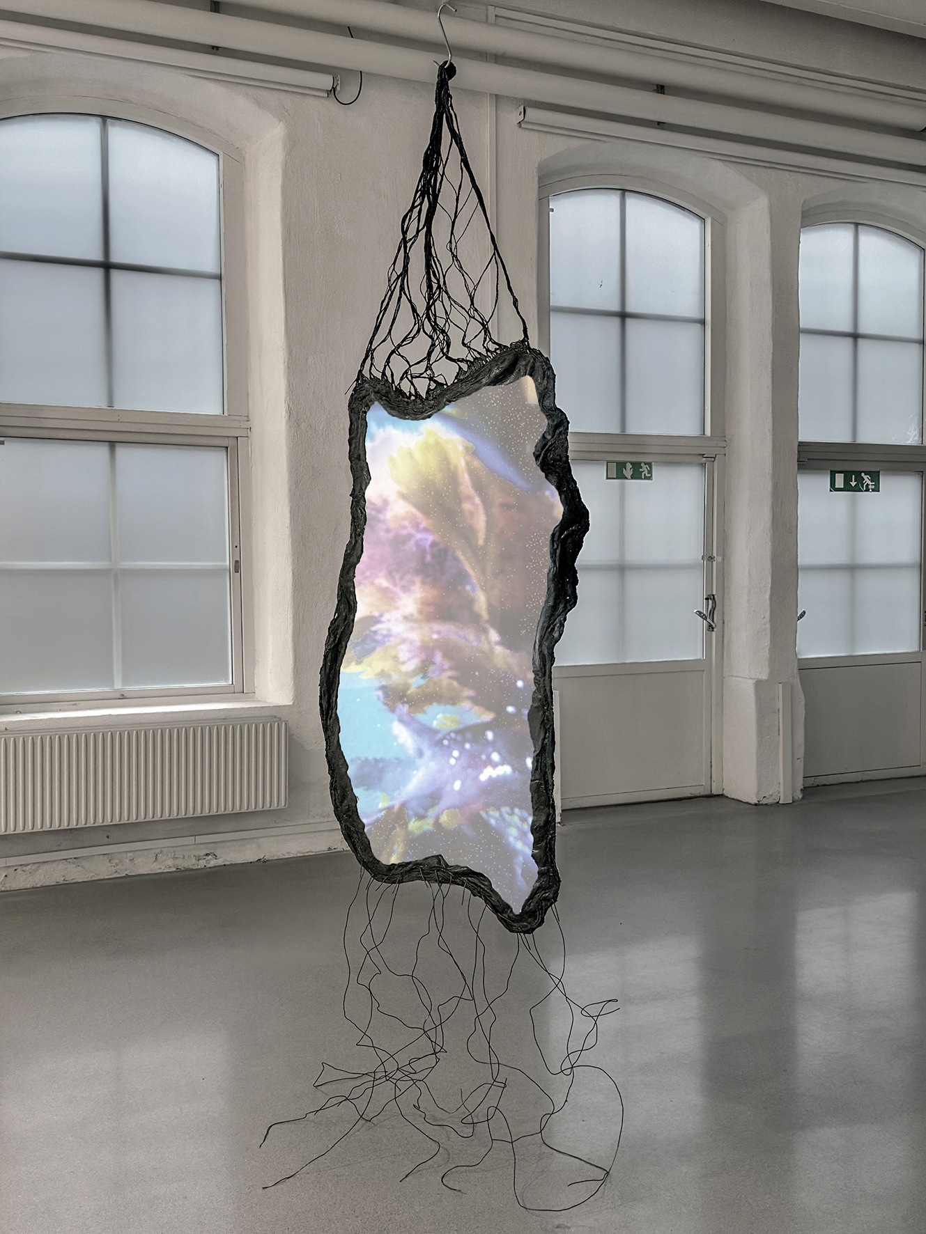 Susanne Fagerlund, "Submerged", 2025. Video projection on transparent fabric. Latex, iron and fabric. 