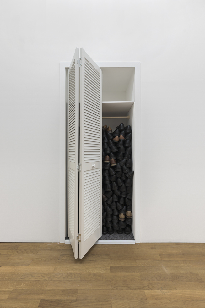 Exhibition view: Diamond Stingily, Orgasms Happened Here 2 (Munich Shoes), 2025, Closet doors, leather shoes, carpet, shelf and curtain rod, 208.1 x 82.4 x 70 cm