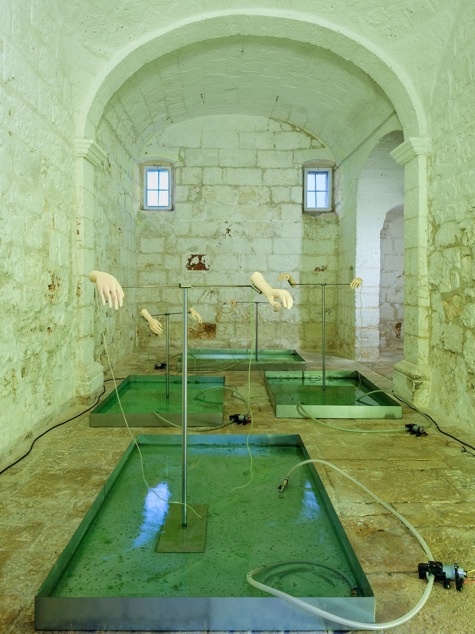 Tidal, Porous, and Fragmentary, 2025, ceramic, water, dye, galvanized iron, stainless steel, PVC pipes, water diaphragm pumps; environmental dimensions, installation view, ph. Marino Colucci