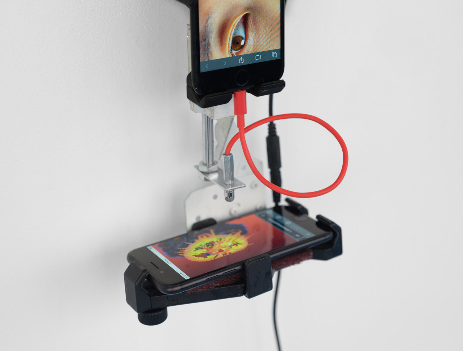 Yehwan Song, Witnessing (detail) , 2026 Two phone, divere materials, 38 × 18 × 12 cm