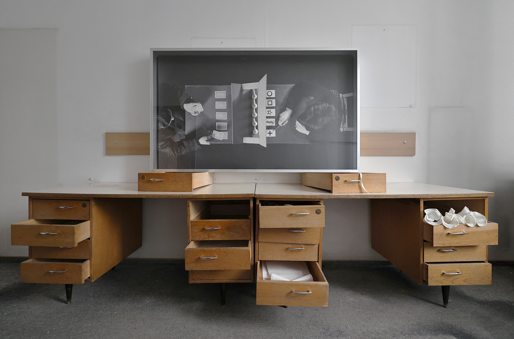 Andreea Anghel - The Voight-Kampff Test - Found objects (antique ceramic wall hooks) UV print on vinyl, fibreboard, wood, aluminium, plexiglass. 170 x 100 x 16 cm. 2023