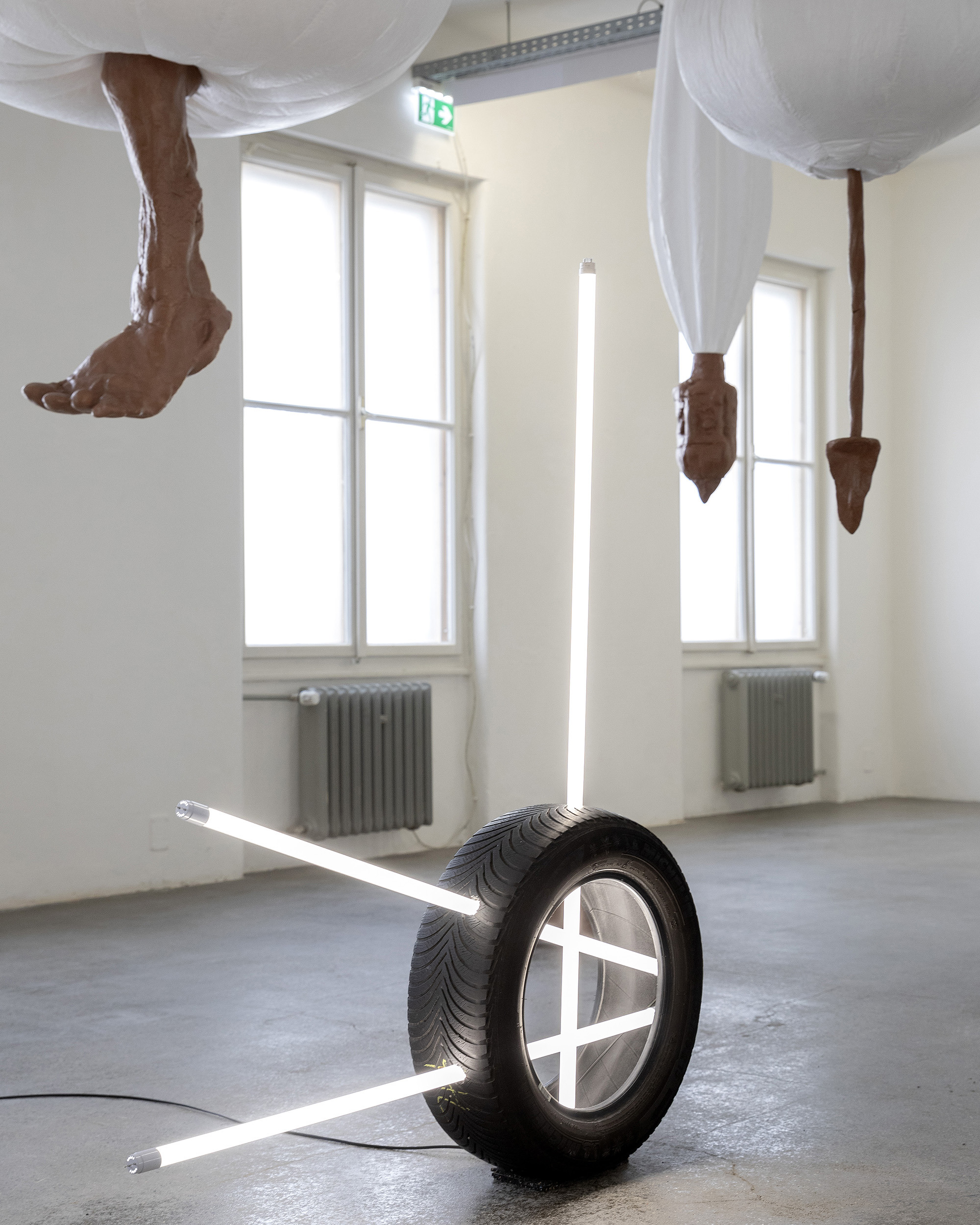 Vasco Costa, Anarchists Turn Right,  2025 Car tyres, LED neon tubes, 120 × 60 × 60 cm