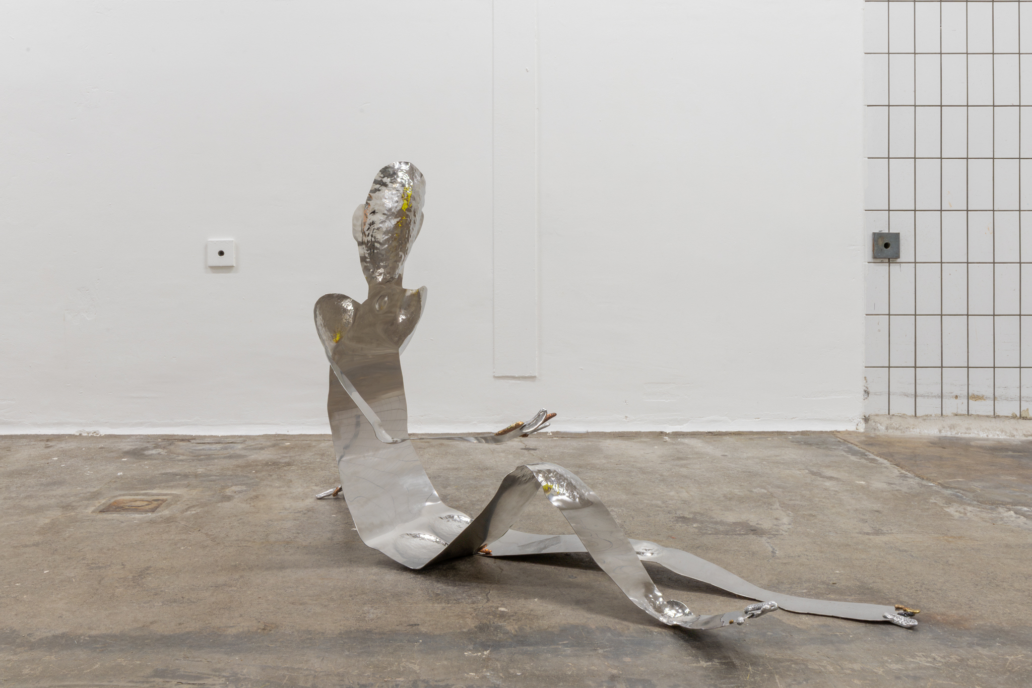 Matti Sumari: Renki (the farmhand), 2023, stainless steel (from an illegal catering operation), Nordic Gold alloy, aluminium, copper, slag stone, cast from found metal, 100 x 160 x 60 cm