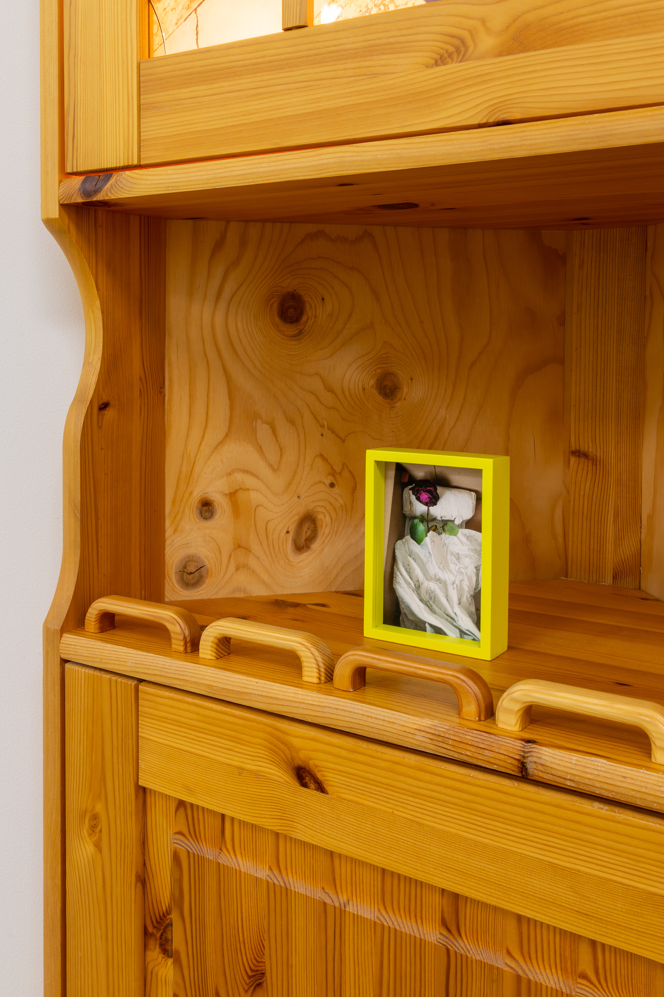 Hertta Kiiski & Janne Punkari: Valokaappi (Lightbox), 2025, cabinet, pigment print on reflective film, LED lights, handles, pigment print on aluminium, sulfur-yellow frame with museum glass, 196 x 64 x 41 cm