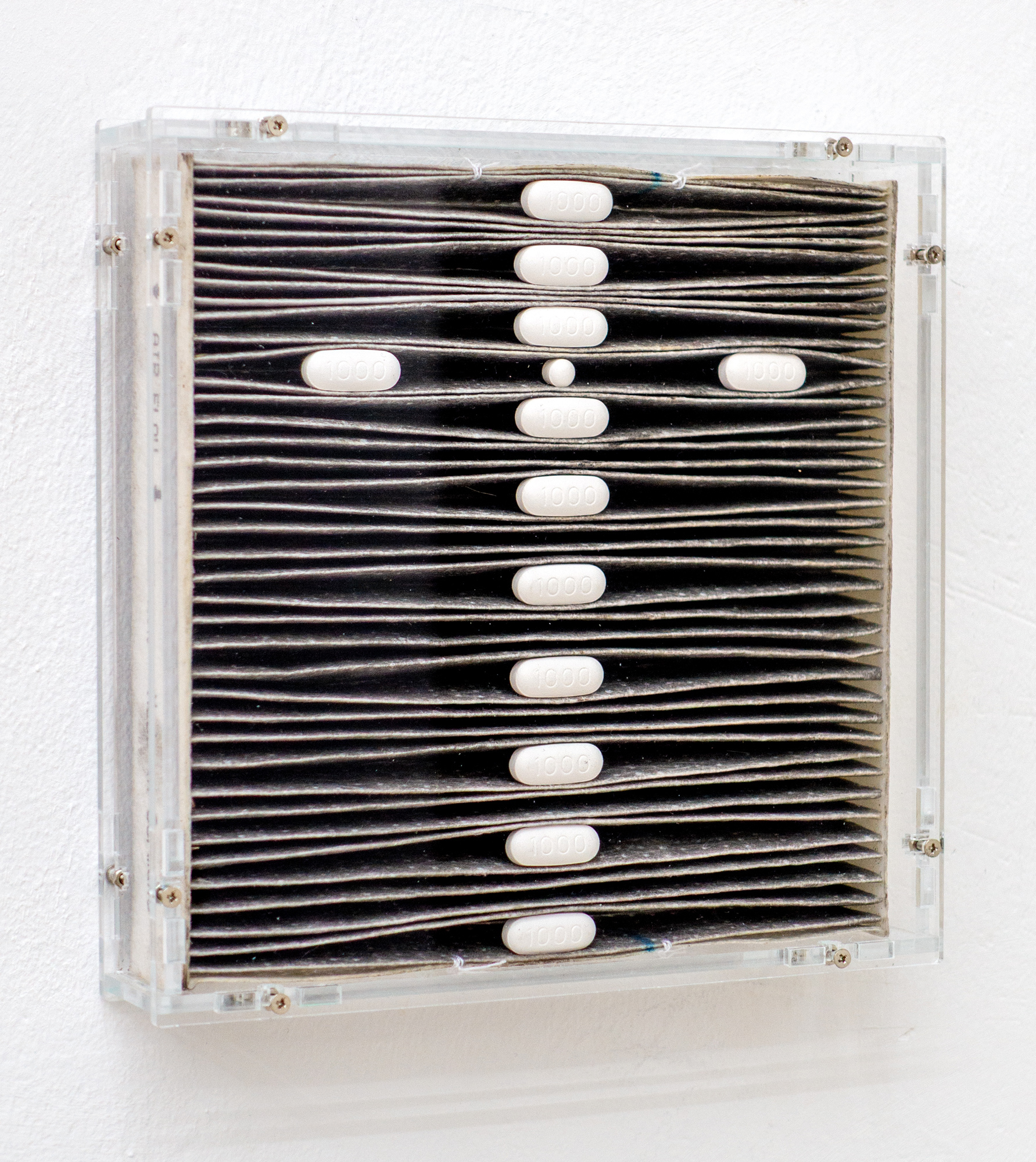 Kurt von Bley · Twelve thousend plus · Used air filter, tablets, thread · 21 × 22 × 4 cm · 2025