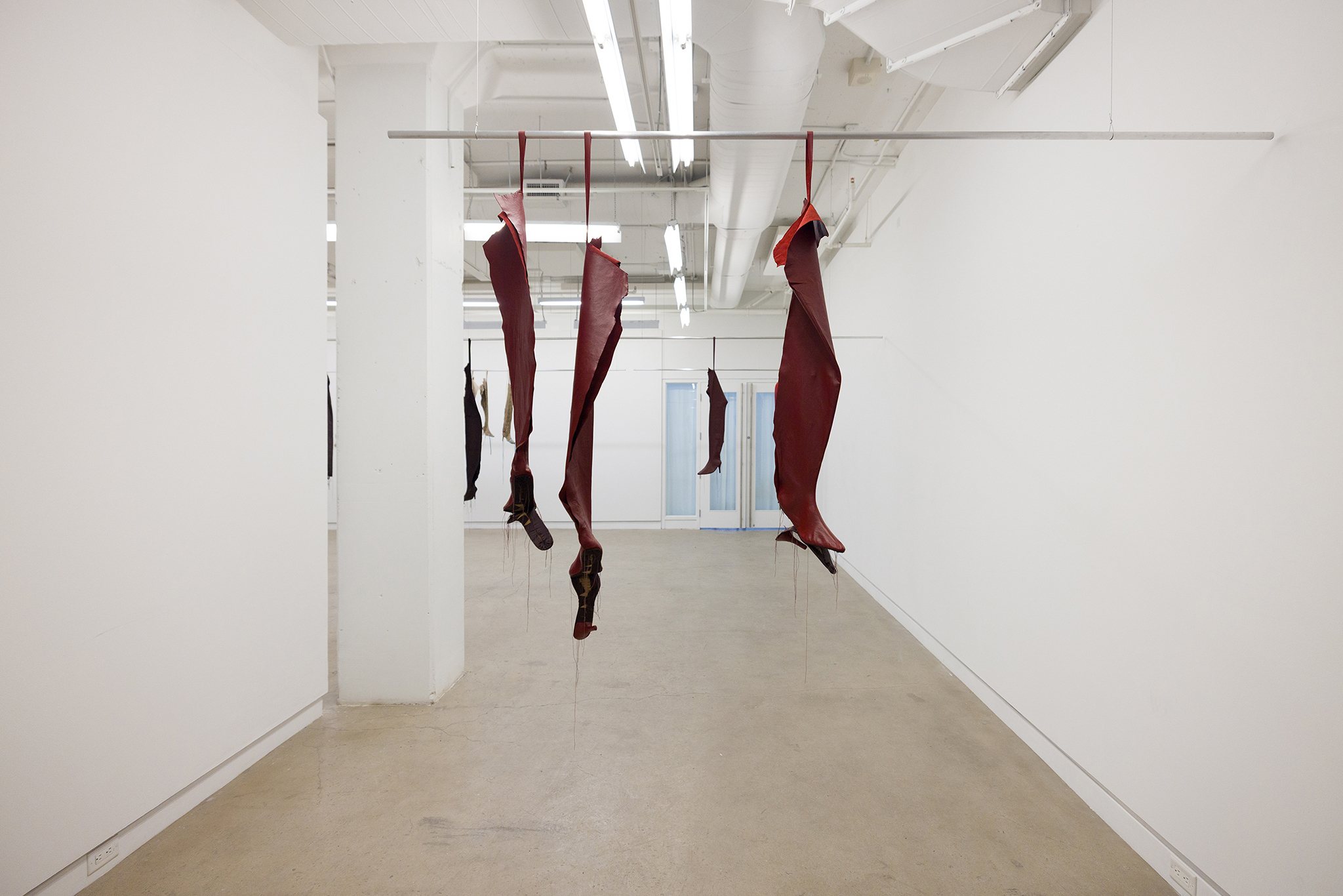 Spitting, 2026 - leather, silk, thread, horse hair, mat board, aluminum