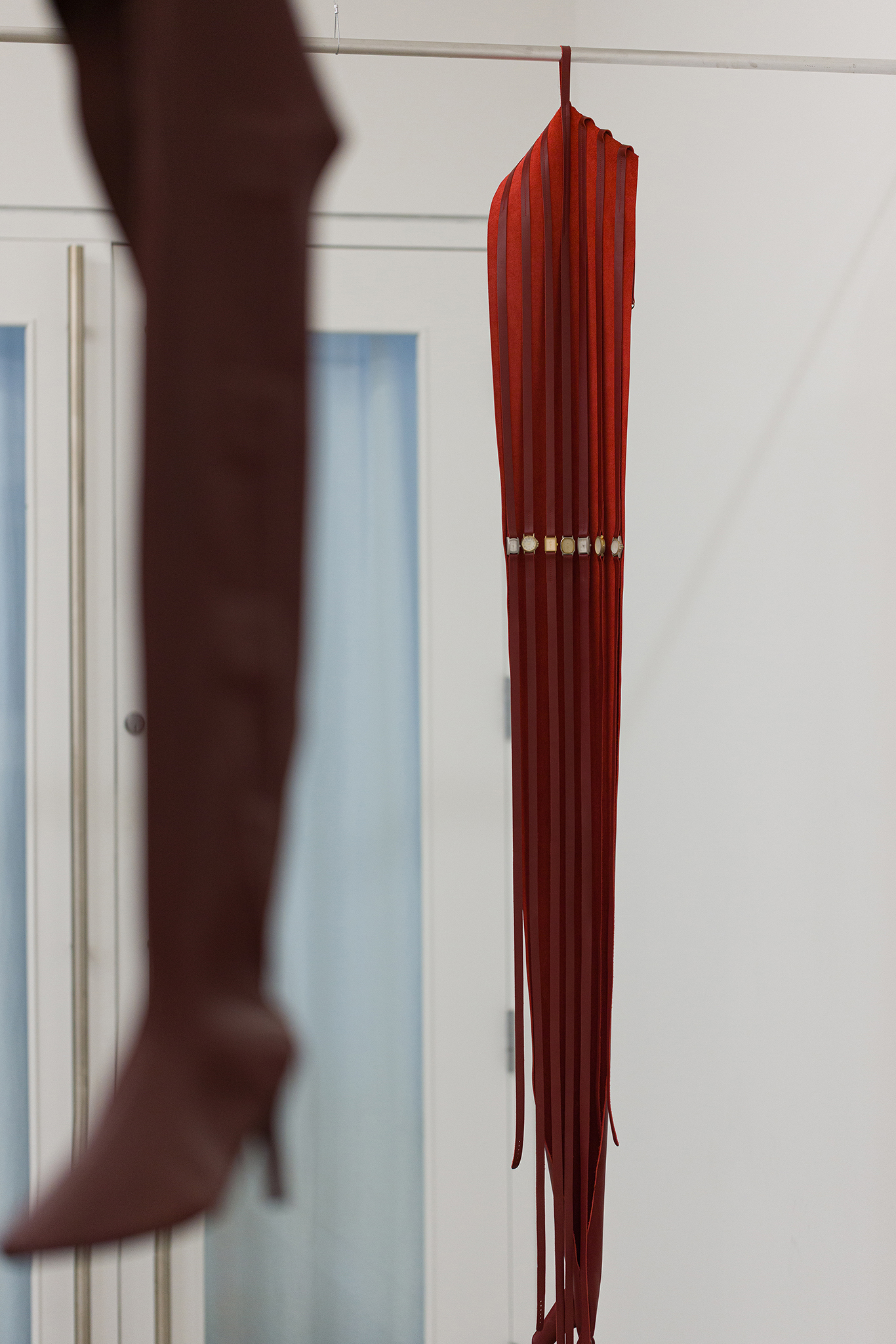 Hands, 2025 - leather, sandblasted watch faces, watch buckles, aluminum