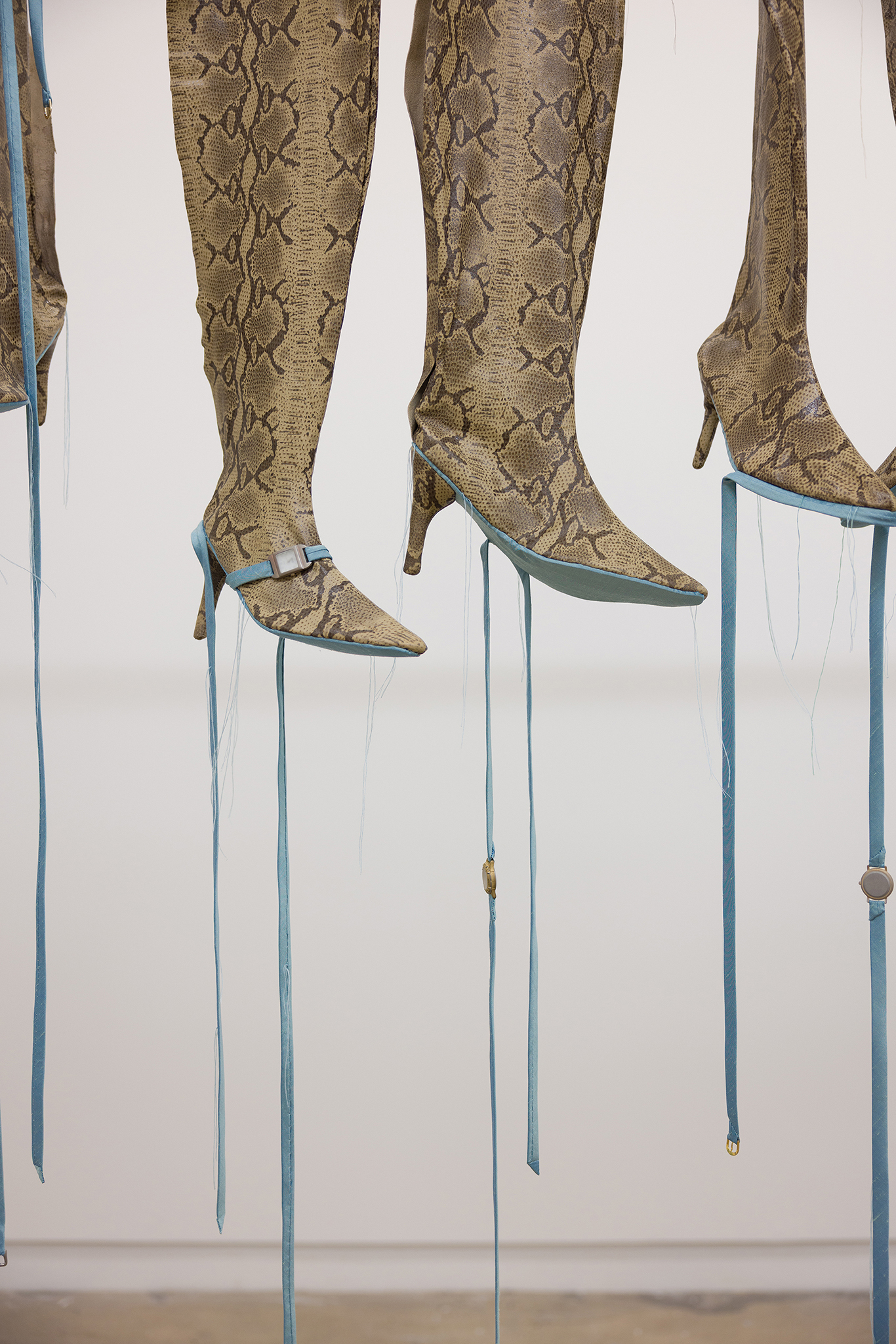 detail of Split Hairs, 2026 - leather, silk, thread, sandblasted watch faces, watch buckles, horse hair, mat board, aluminum