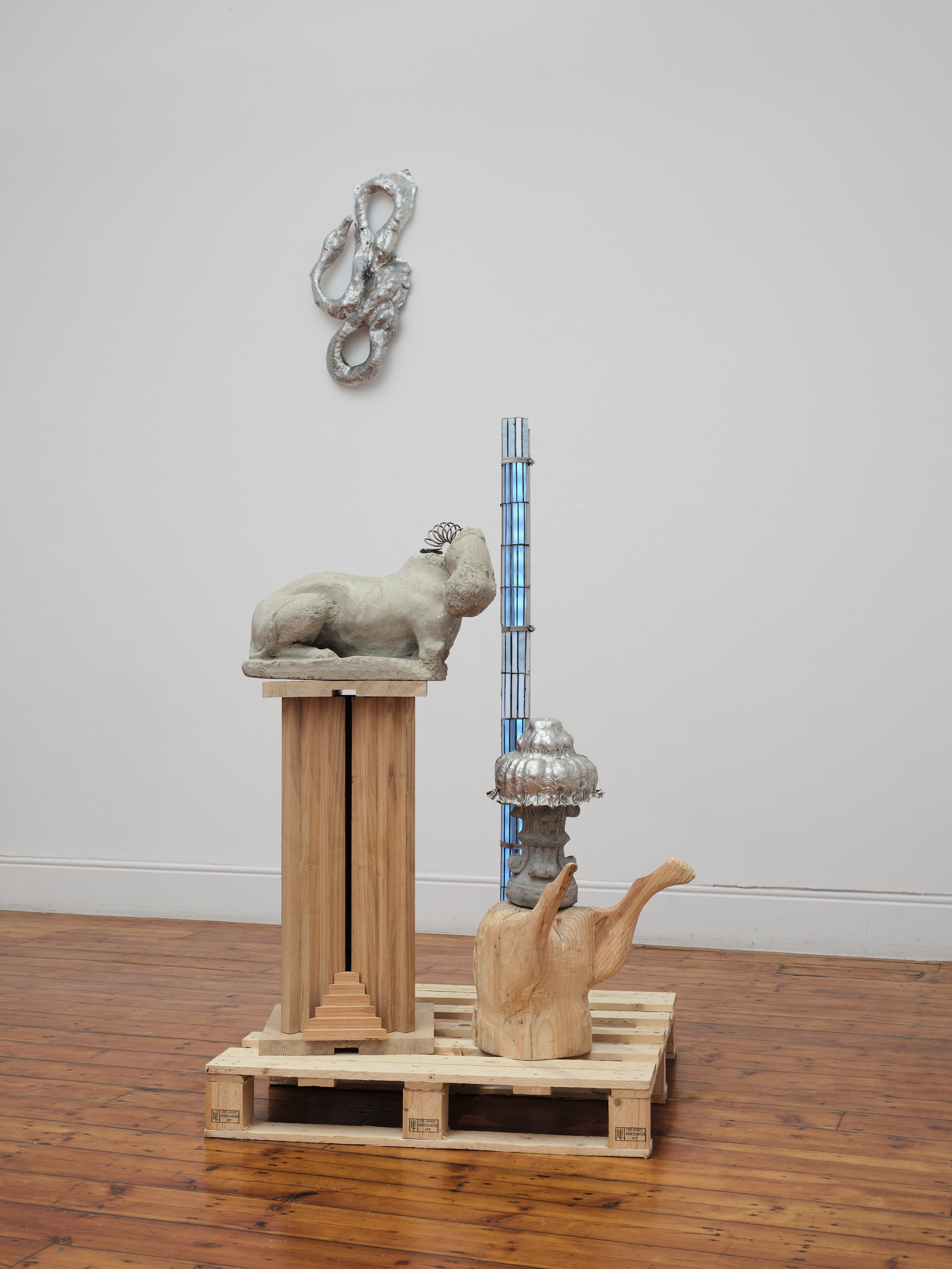 Casino-Museum Cosmology, 2025 Cement, ash (wood), pine (wood), forged aluminium, stained glass, stainless steel, LEDs 155 x 100 x 100 cm