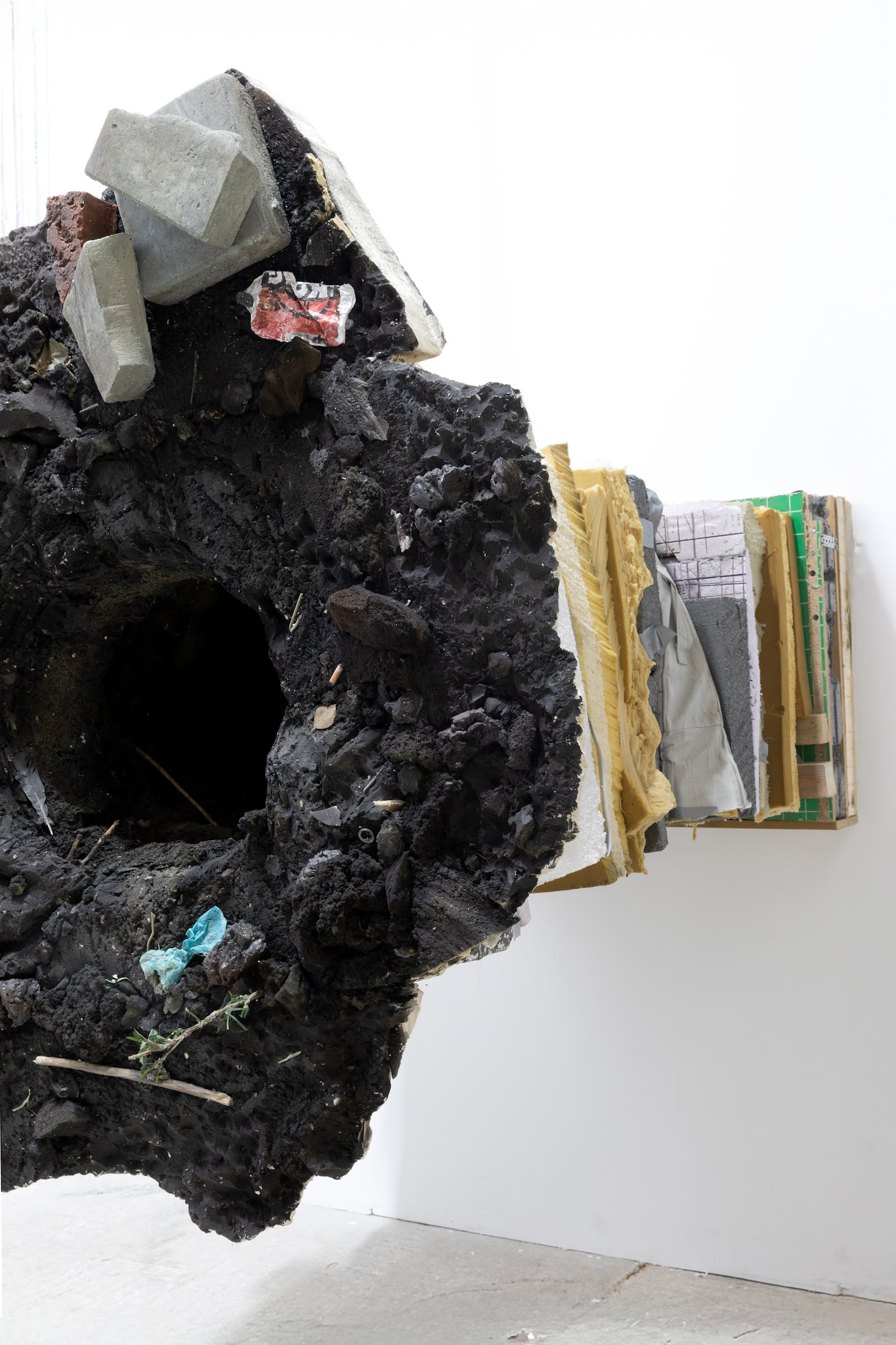 Stijn ter Braak, Pit, 2025, 200 × 110 × 110 cm, Wood, paper, isolation foam, glue, acrylic paint, plastic foil, cardboard, spray paint, tape