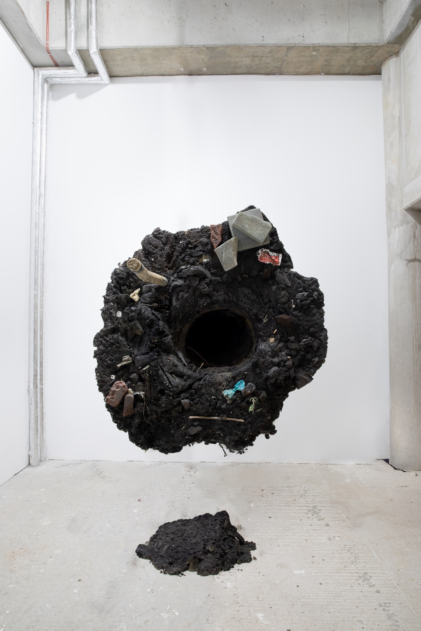 Stijn ter Braak, Pit, 2025, 200 × 110 × 110 cm, Wood, paper, isolation foam, glue, acrylic paint, plastic foil, cardboard, spray paint, tape