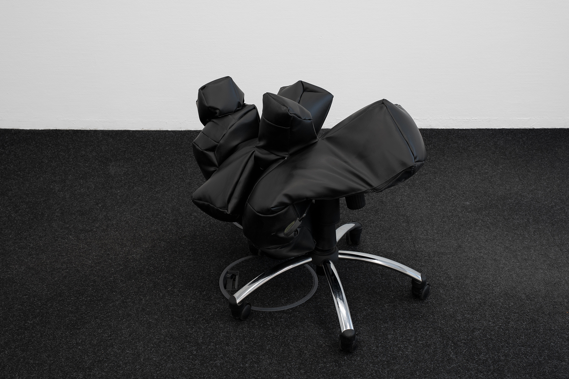 Miriam Steinmacher, softskills, 2018, Fake leather, office chair, wood, upholstery Dimensions variable 