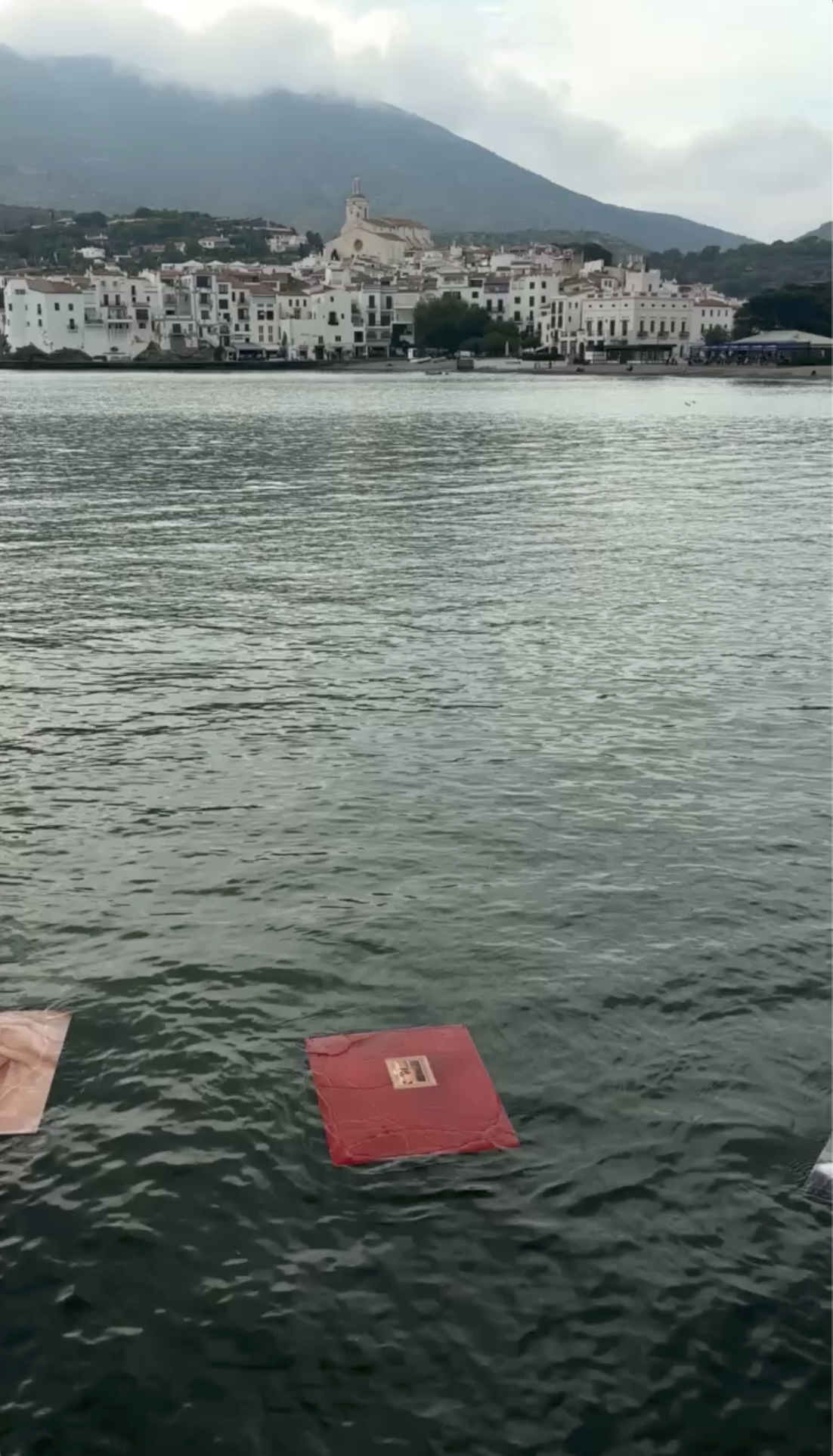 Trust Me — Floating photographic installation at InCadaqués Festival, exploring intimacy, trust, and perception through the interplay of water, light, and movement.