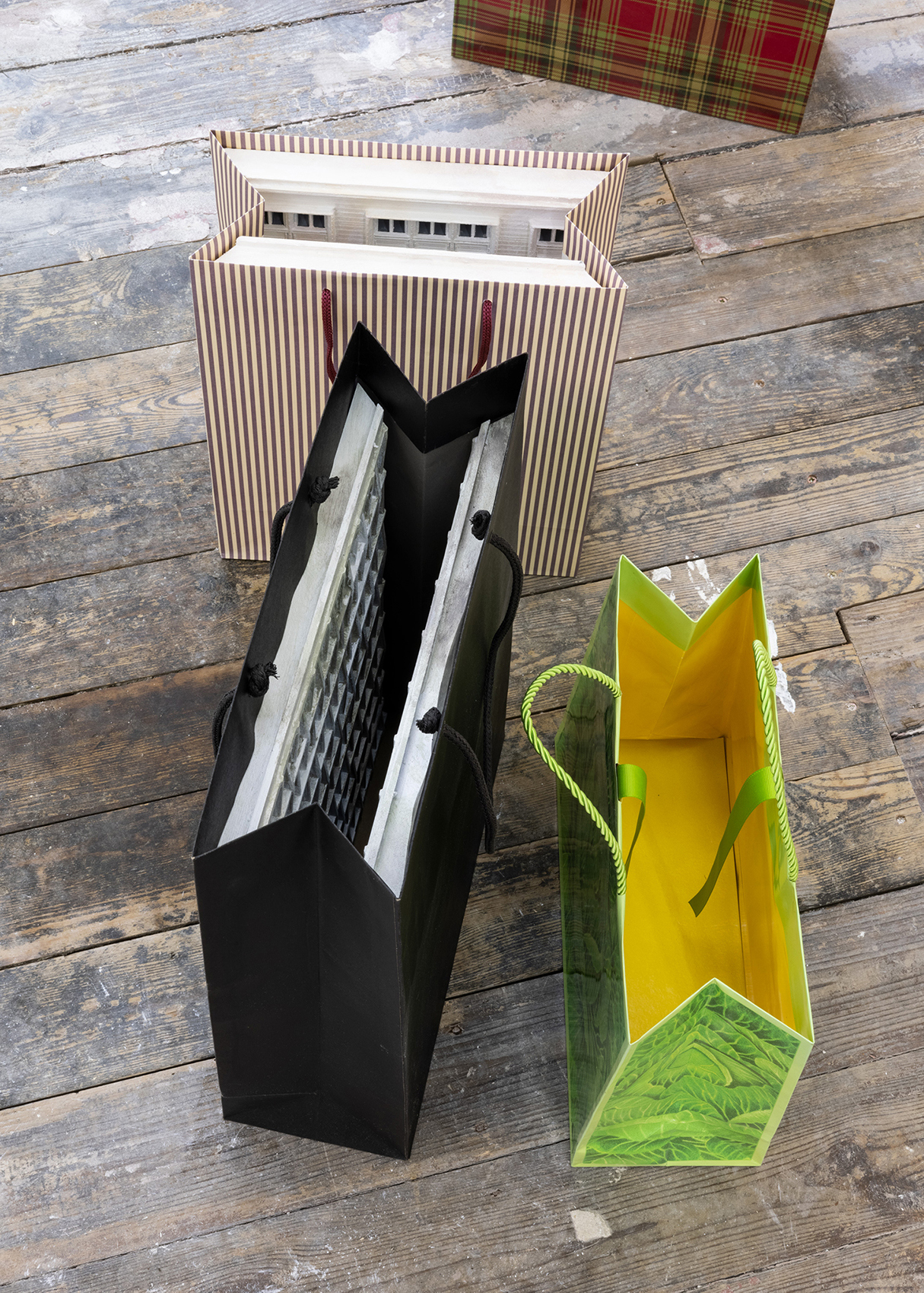 Bags, Mara Jenny, 2026. Bags, some of them painted, house facades, all painted, various dimensions. ©Fabrice Schneider