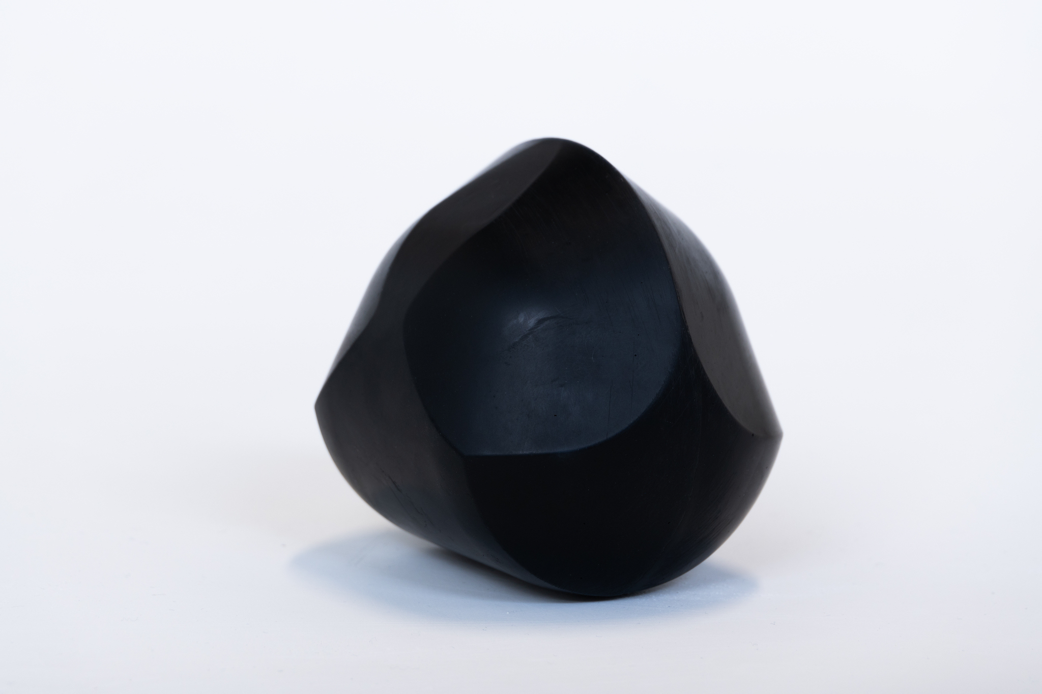 Therese Norgren, Gömböc, 2025, jesmonite, black pigment, ca 13 x 8 x 7 cm