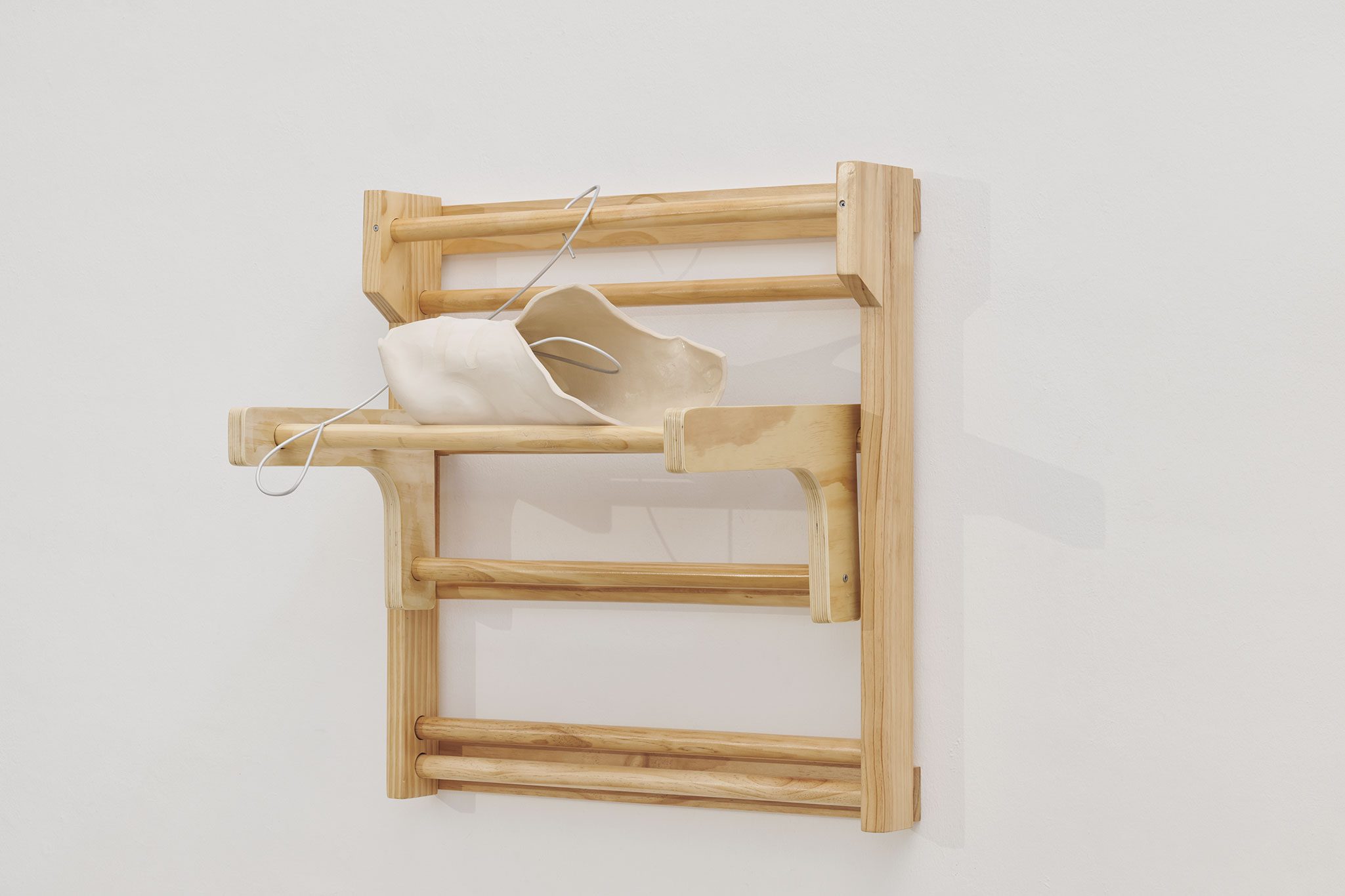 Fawn (2024), wall bars, ceramic, aluminum bar 