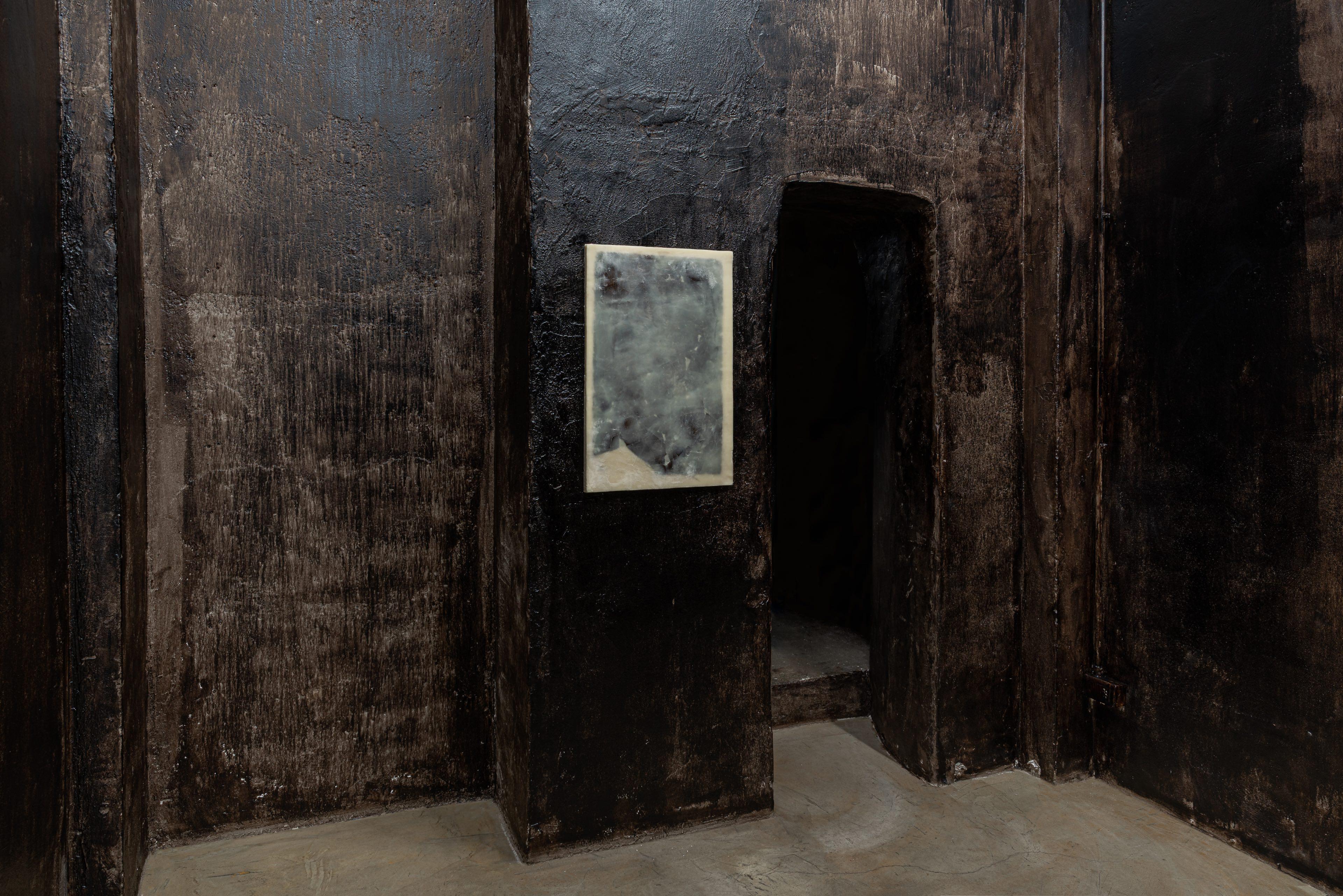 Nicola Martini, Sippe (Not titled yet), 2026 Microcrystalline wax, bitumen, plaster, 47 x 72,5 x 2,5 cm