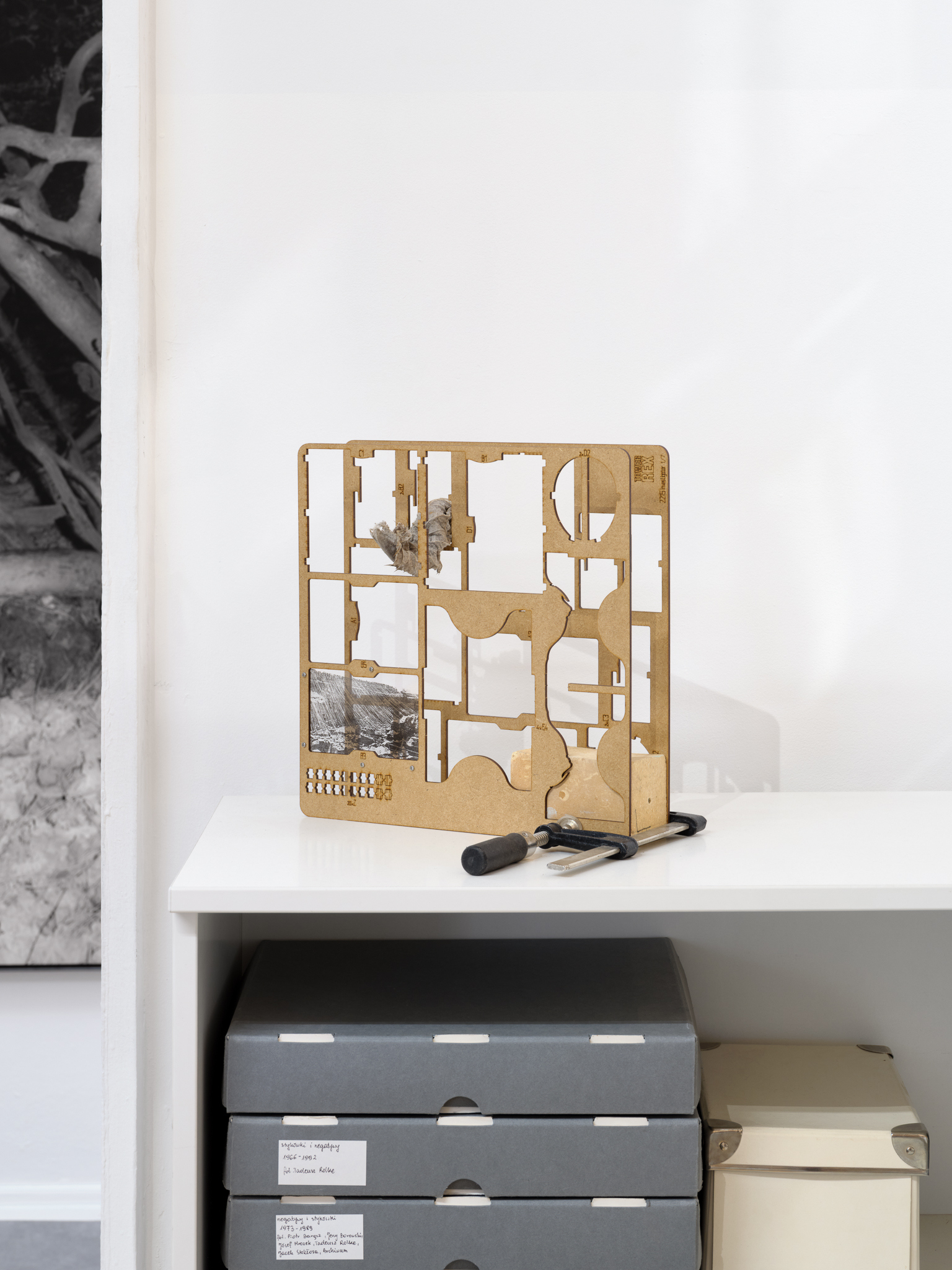 Kasper Lecnim, Irmina Rusicka, Untitled, 2026, MDF board, foil print, thistle, Purenit, carpenter’s clamp, 30 x 30 x 25 cm