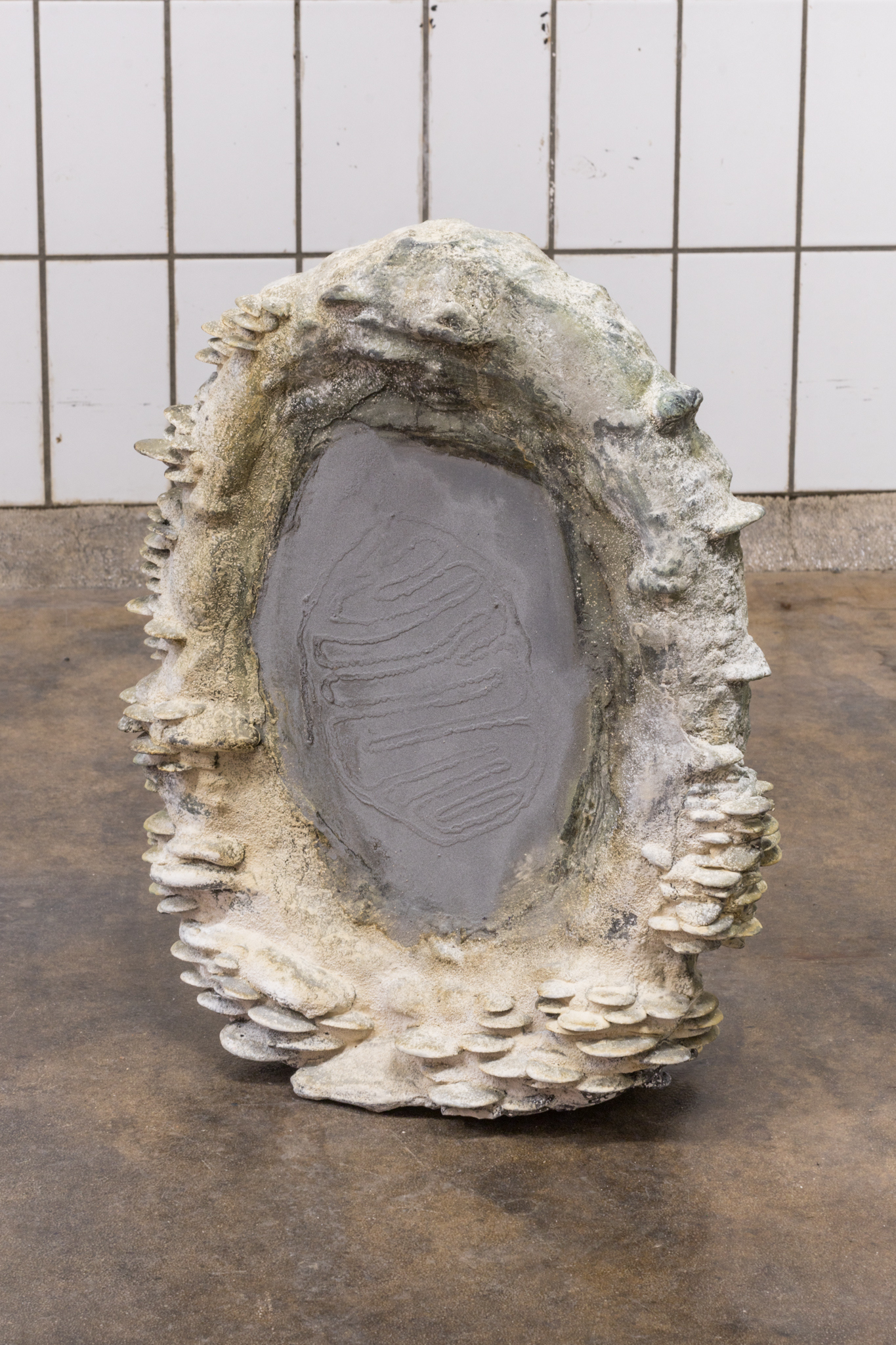  Alma Heikkilä: mitochondrion, 2025, plaster, polyester, inks and pigments, styrofoam, resin, 43 x 47 x 42 cm