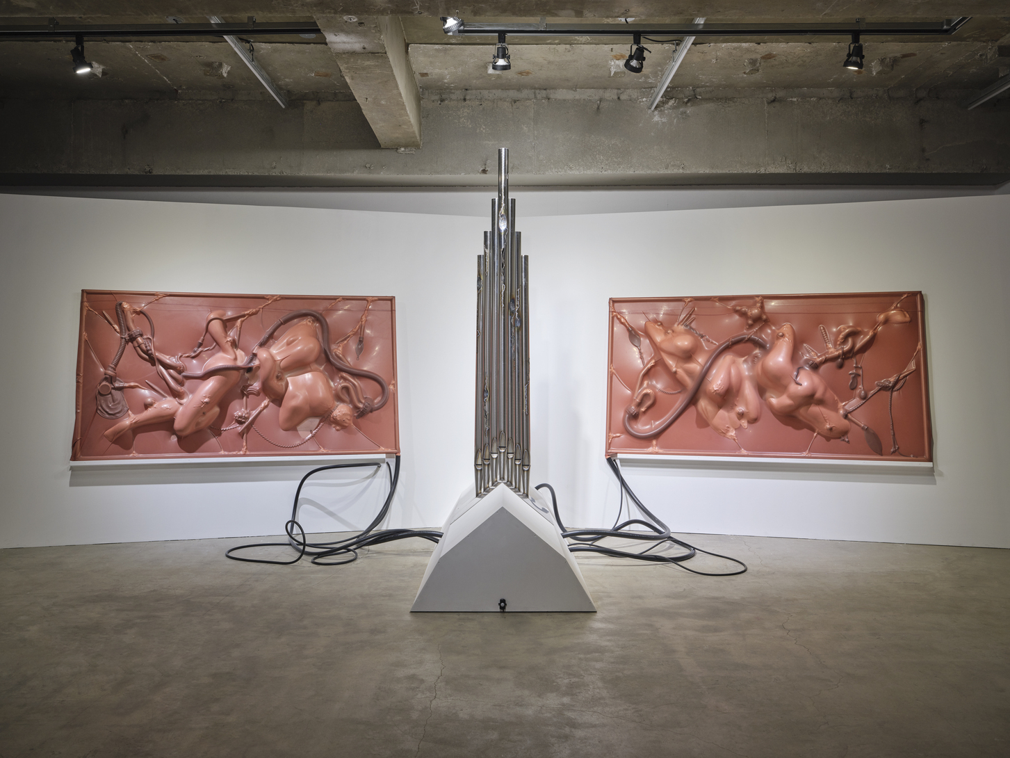When All Flesh Turns to Light, 2026, Stainless steel, latex, vacuum cleaner, sensor timer, CNC-machined styrofoam, sex toy, mixed media, dimensions variable