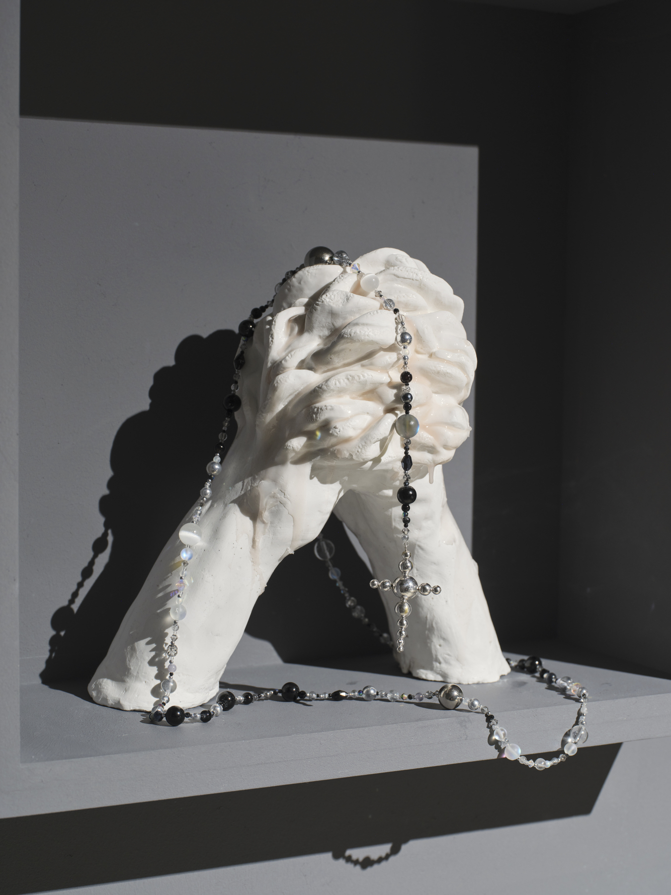 The Sap that Touched the Sky, 2026, Plaster casting, silicone, platinum-plated brass casting, beads, mixed media, 24×15×24cm