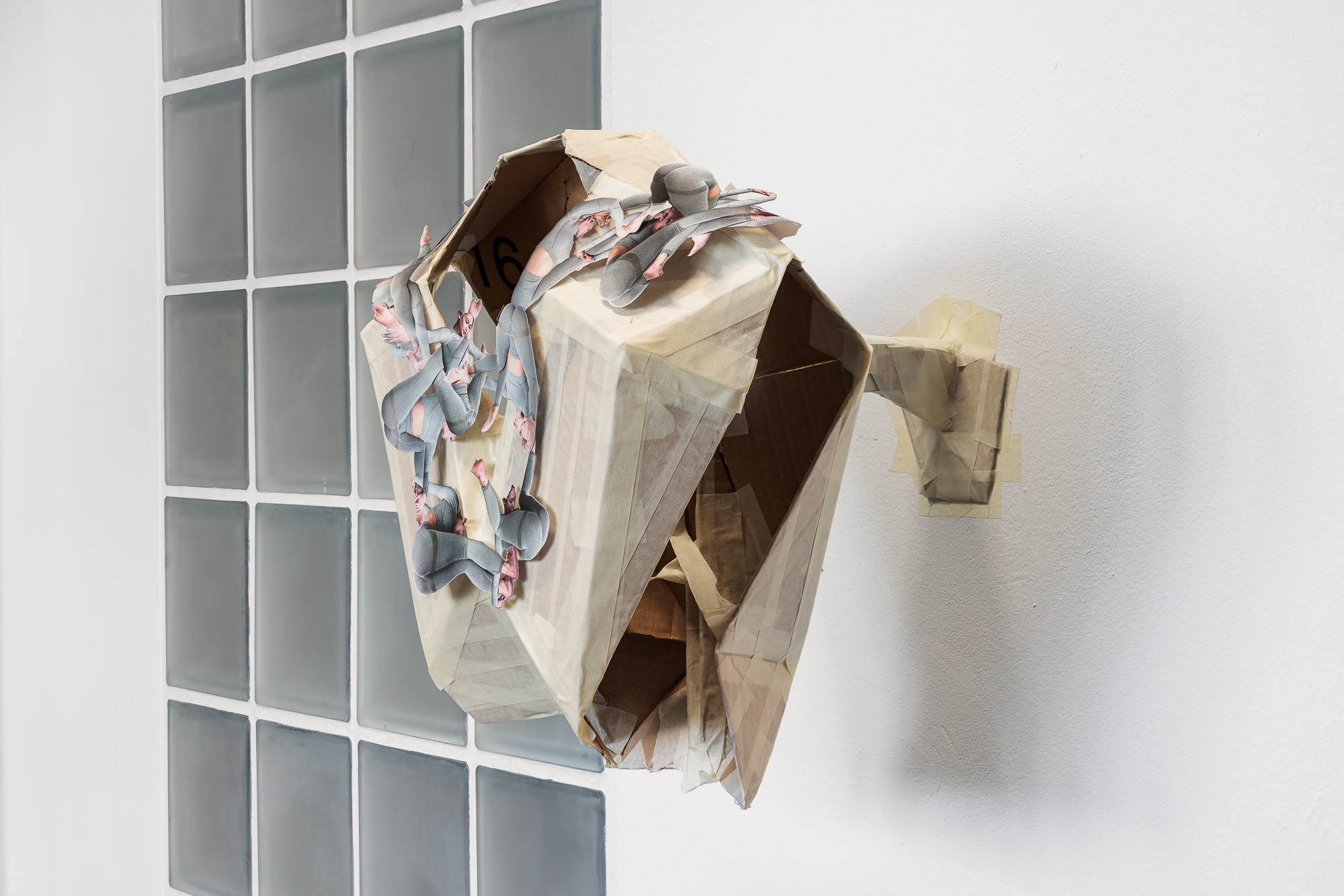 Moritz Fuehrer, Turn of the Century, 2026, Cardboard, masking tape, laser print, clear tape, 34 × 38 × 33 cm