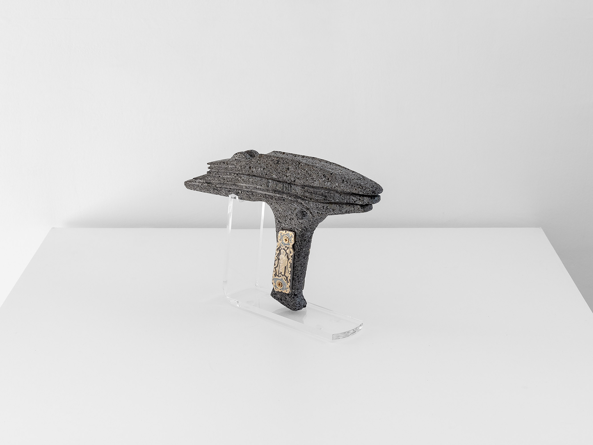 San Judas Beyond Starfleet, 2026, Basalt, custom gun grips Colt .22, 32 x 8 x 23 cm