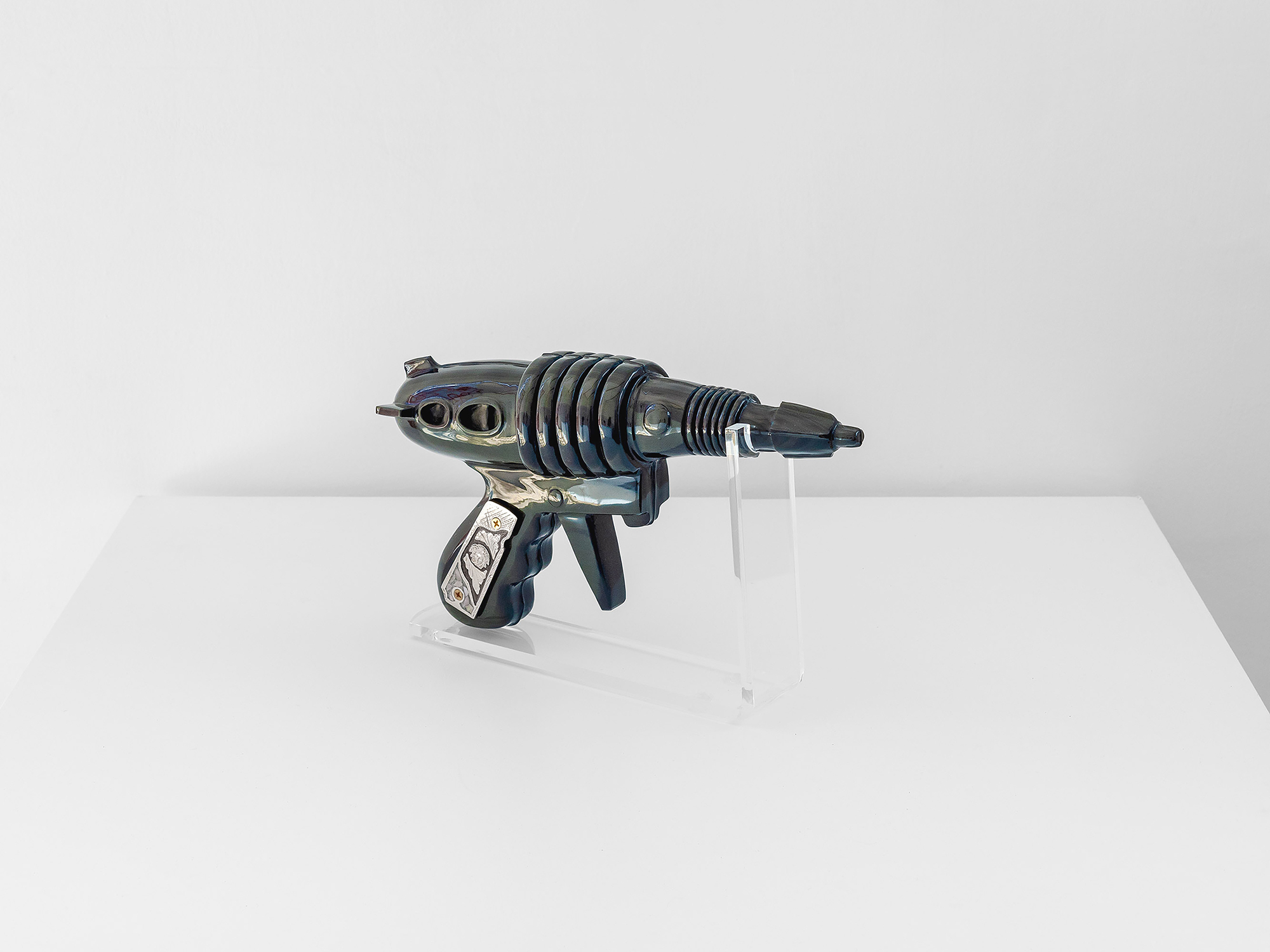 Versace X Ray Gun, 2026, Rainbow obsidian, custom gun grips Colt .22, 35 x 8 x 21 cm