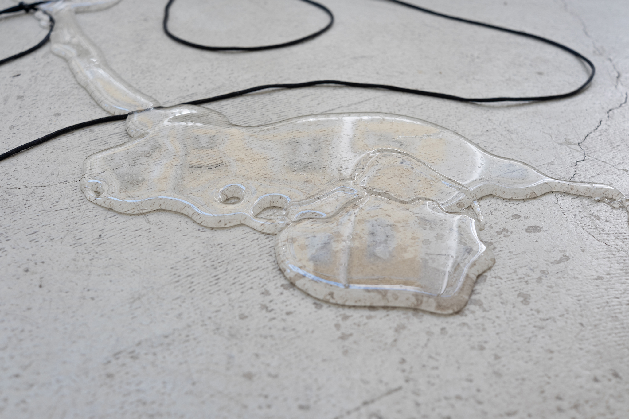 translucent exchange for liquidity, 2026, glazed stoneware, textile threads, PETG, electrics, jelly wax,  380 x 180 x 120 cm