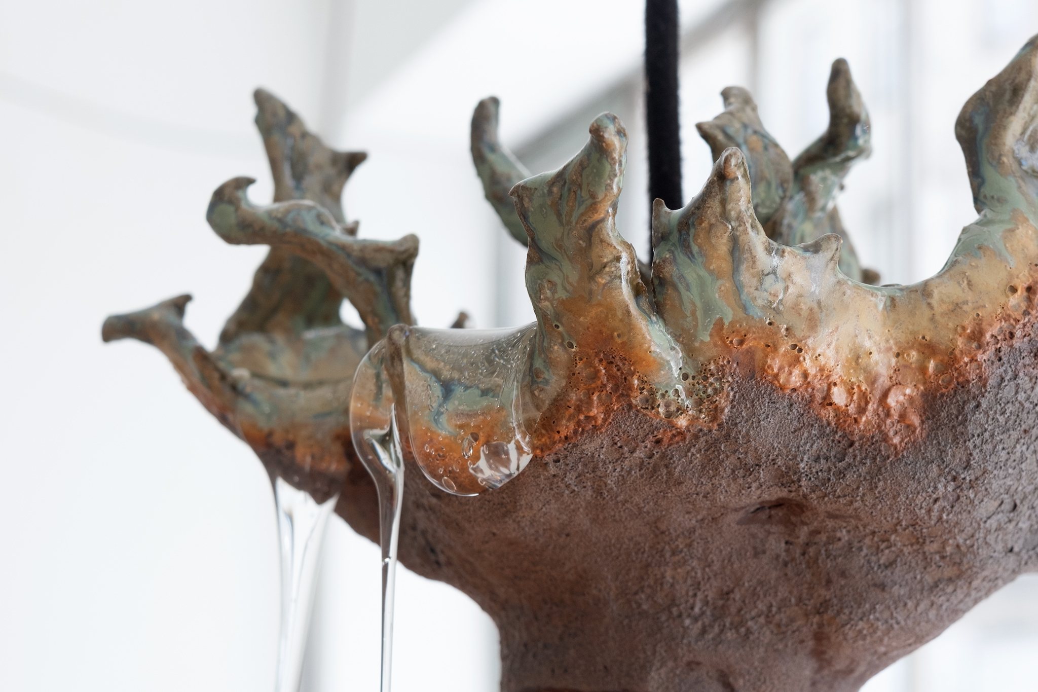 translucent exchange for liquidity, 2026, glazed stoneware, textile threads, PETG, electrics, jelly wax,  380 x 180 x 120 cm