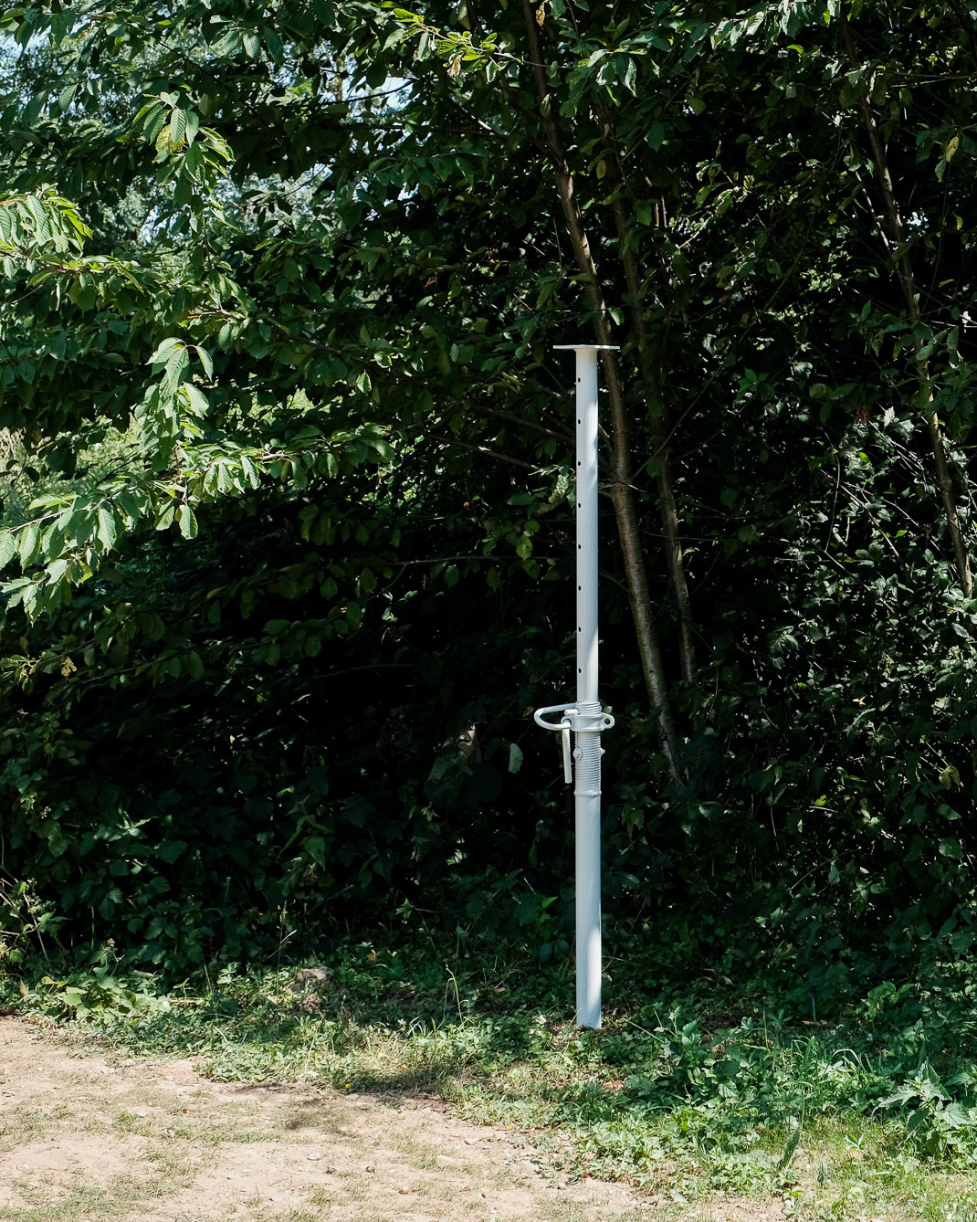 Kriz Olbricht, Epistyl, 2026, Nine scaffolding props, painted grey and positioned at selected locations