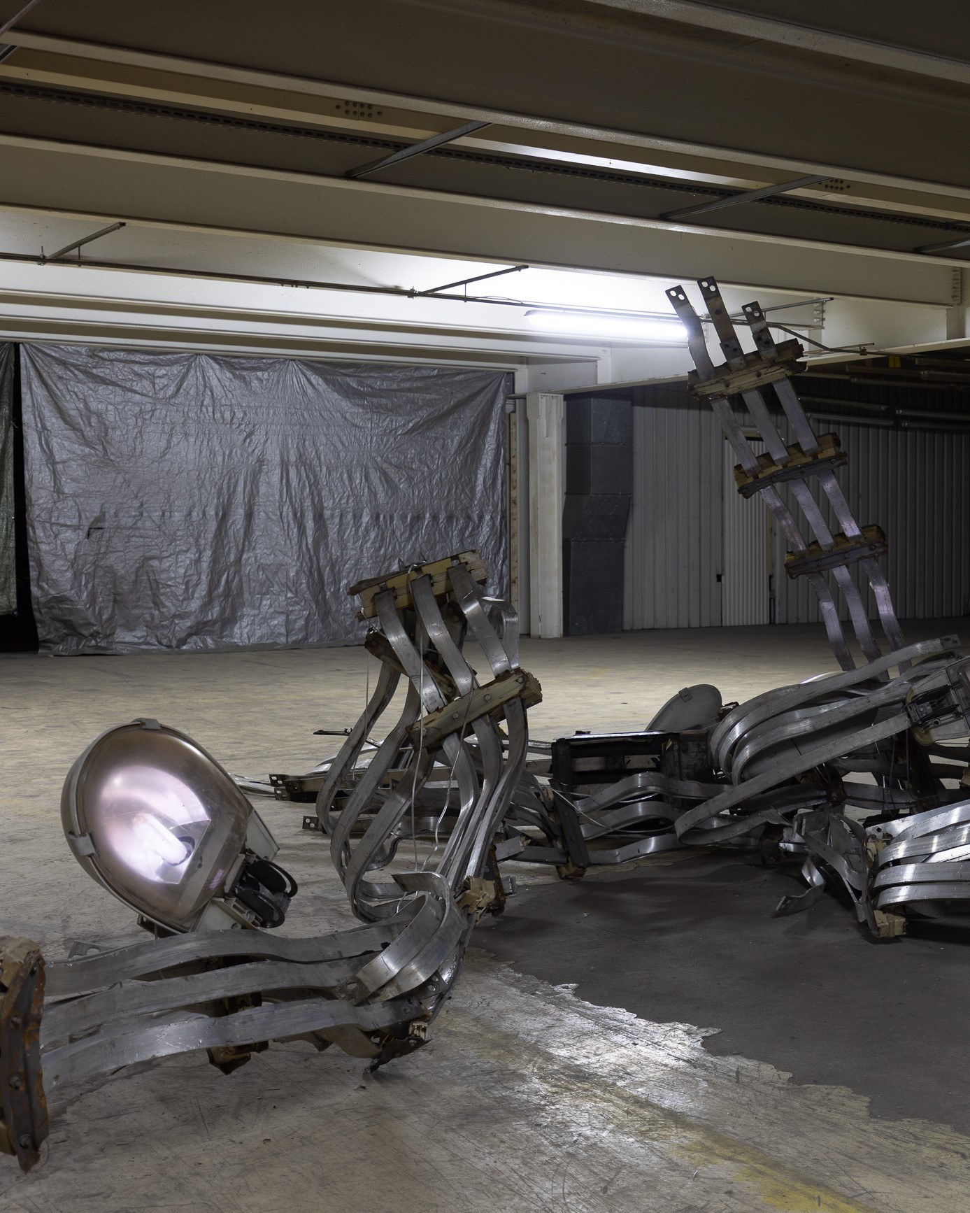 2026 / 6 m x 6 m x 2.3 m / aluminum, steel, street lamp shades, electronics / Photography: Zuza Wudarska