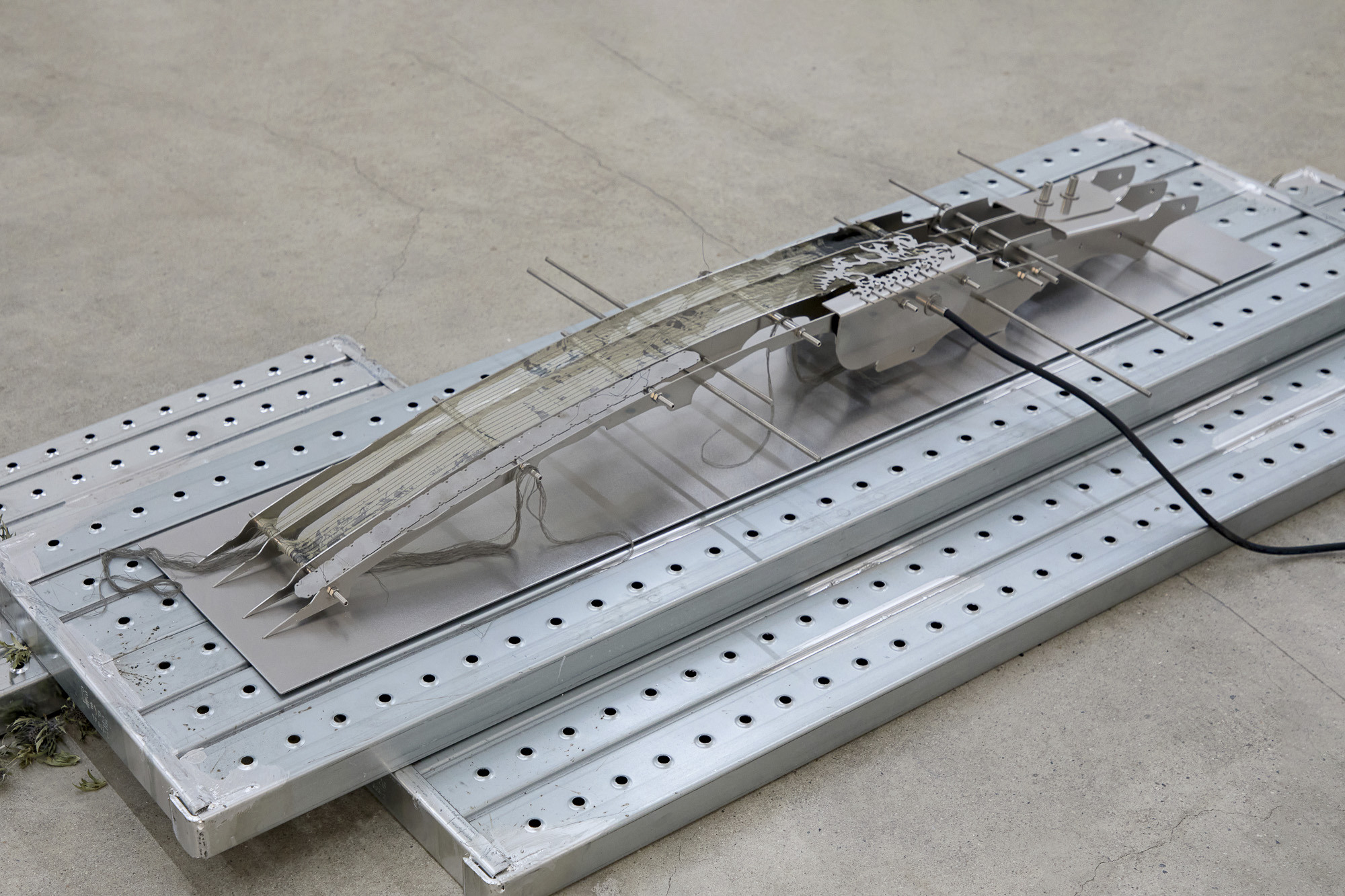 Inside Job (Ula Lucińska, Michał Knychaus), Interstice II, 2026, stainless steel, chrome steel, digital print on organza, cable, 132 cm x 50 cm x 13 cm, CAPTION, Seoul, photo: Bokyoung Han
