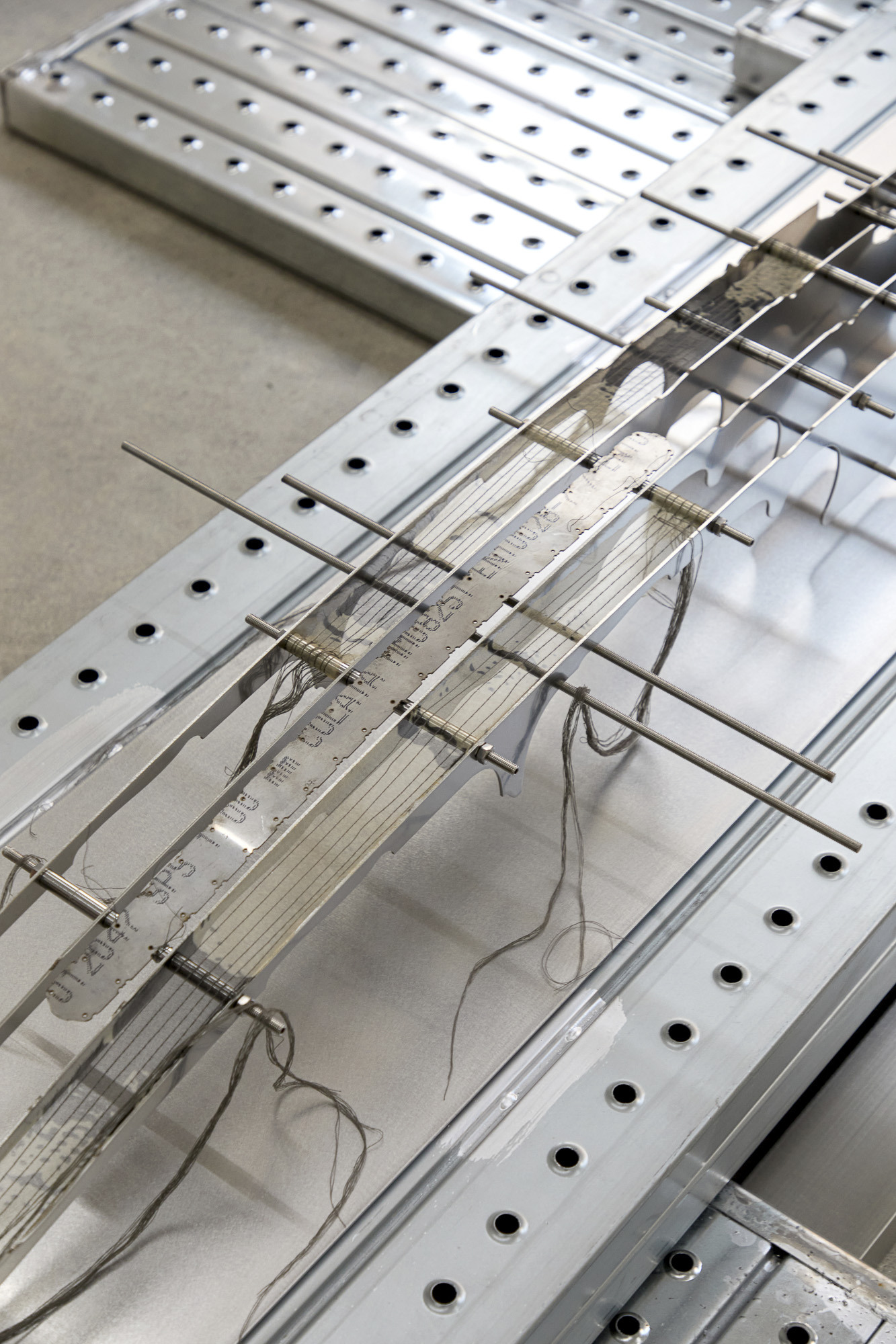Inside Job (Ula Lucińska, Michał Knychaus), Interstice I, 2026, stainless steel, chrome steel, digital print on organza, cable, 151 cm x 50 cm x 13 cm, CAPTION, Seoul, photo: Bokyoung Han