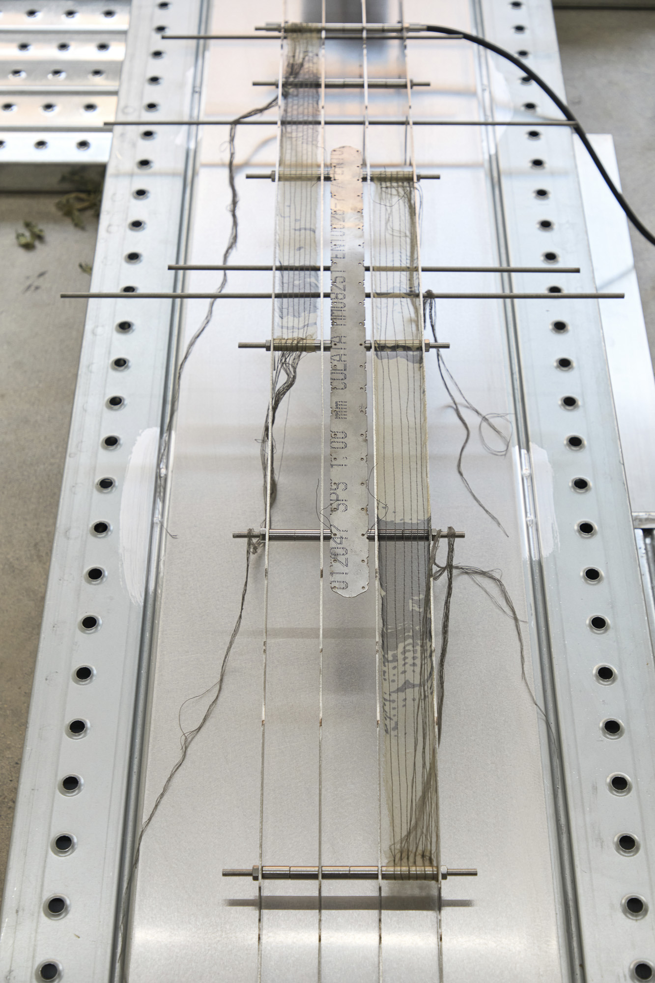 Inside Job (Ula Lucińska, Michał Knychaus), Interstice I, 2026, stainless steel, chrome steel, digital print on organza, cable, 151 cm x 50 cm x 13 cm, CAPTION, Seoul, photo: Bokyoung Han
