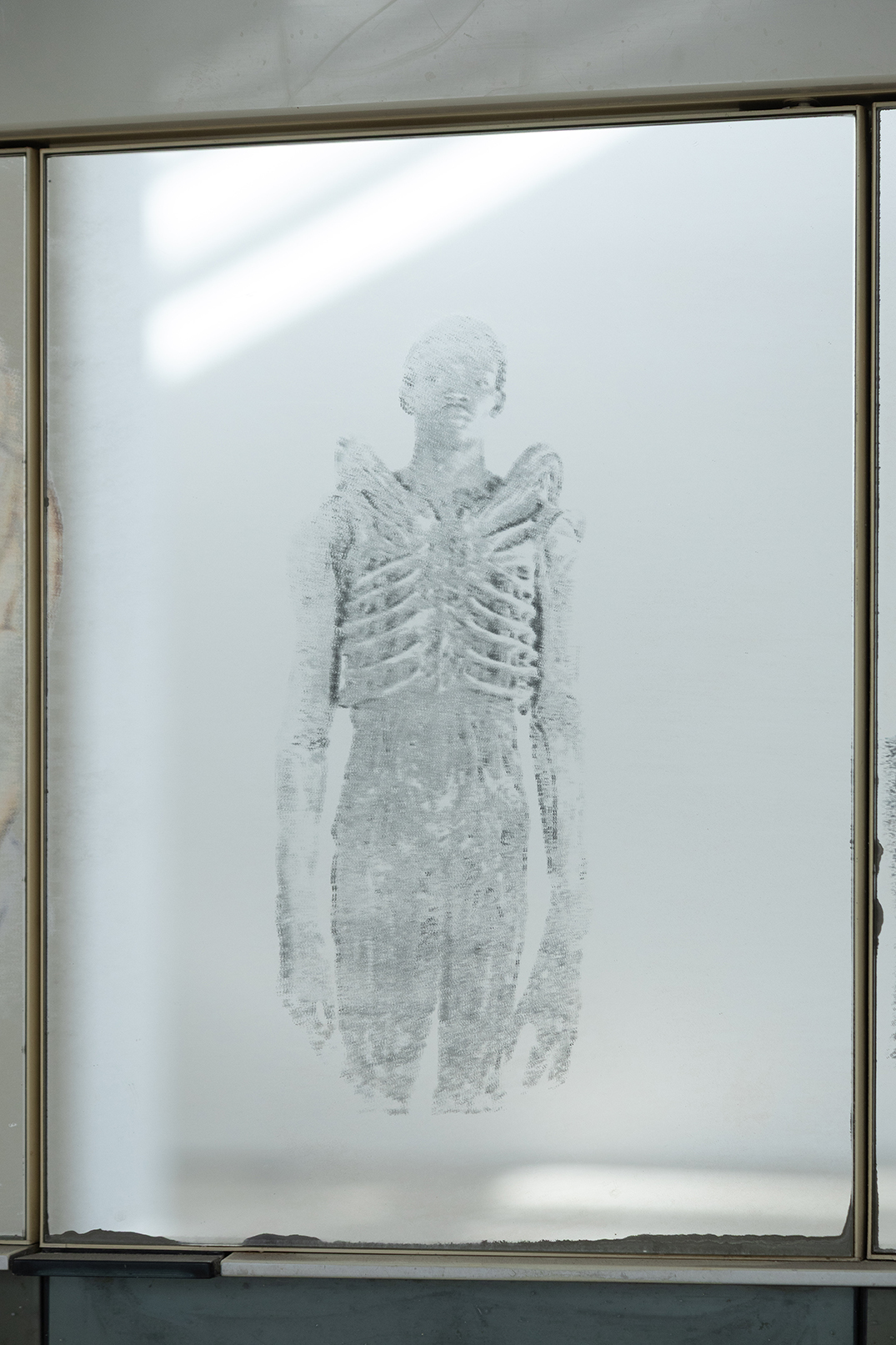 Ladji Diaby, Altar 1, 2026 (detail), dressing table, sheet, transfer on a medicine cabinet, soft toy, angel wings, rhinestones, paperweight, 200 × 156 × 55 cm 