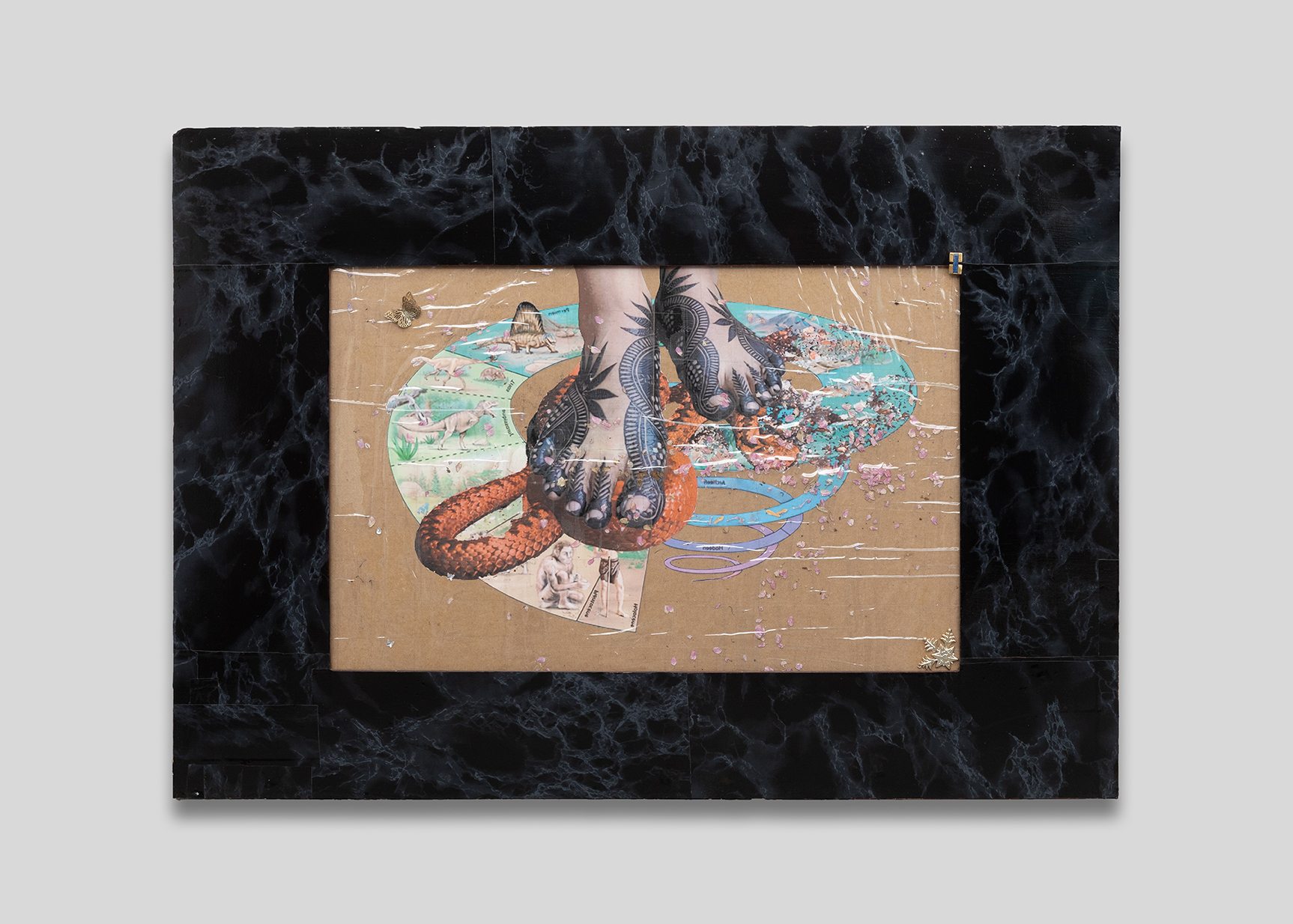 Ladji Diaby, Ma mère et le serpent, 2026, Laser printing, collage, cardboard, wood, adhesive tape, miscellaneous objects, adhesive paper with marble pattern, 70 × 98,8 × 3 cm
