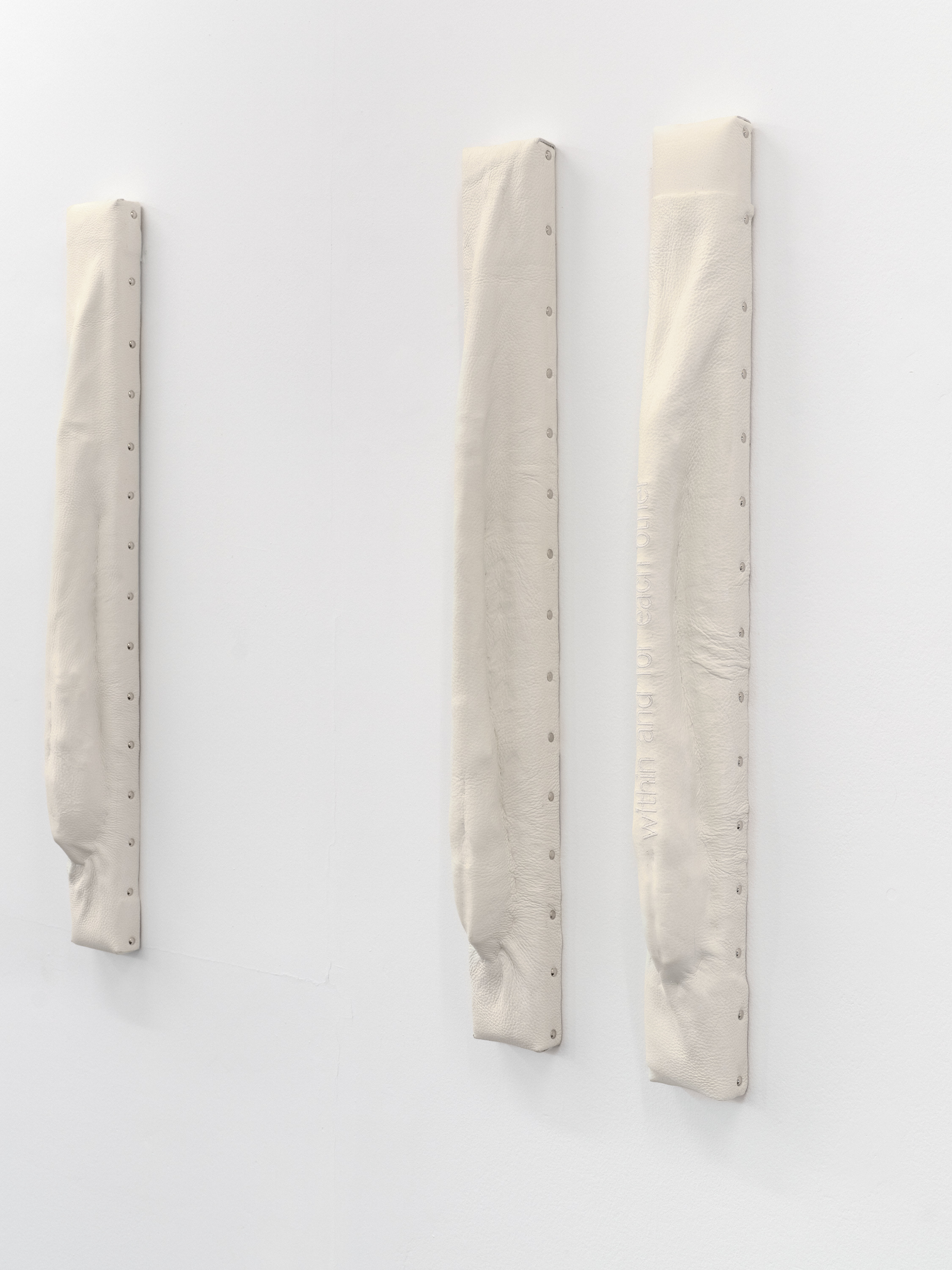 Relief 04 I–VI (2026). Pine Wood, Upholstery Foam, Recycled Leather, White Lacquer. 10 x 5 x 75 cm (each).