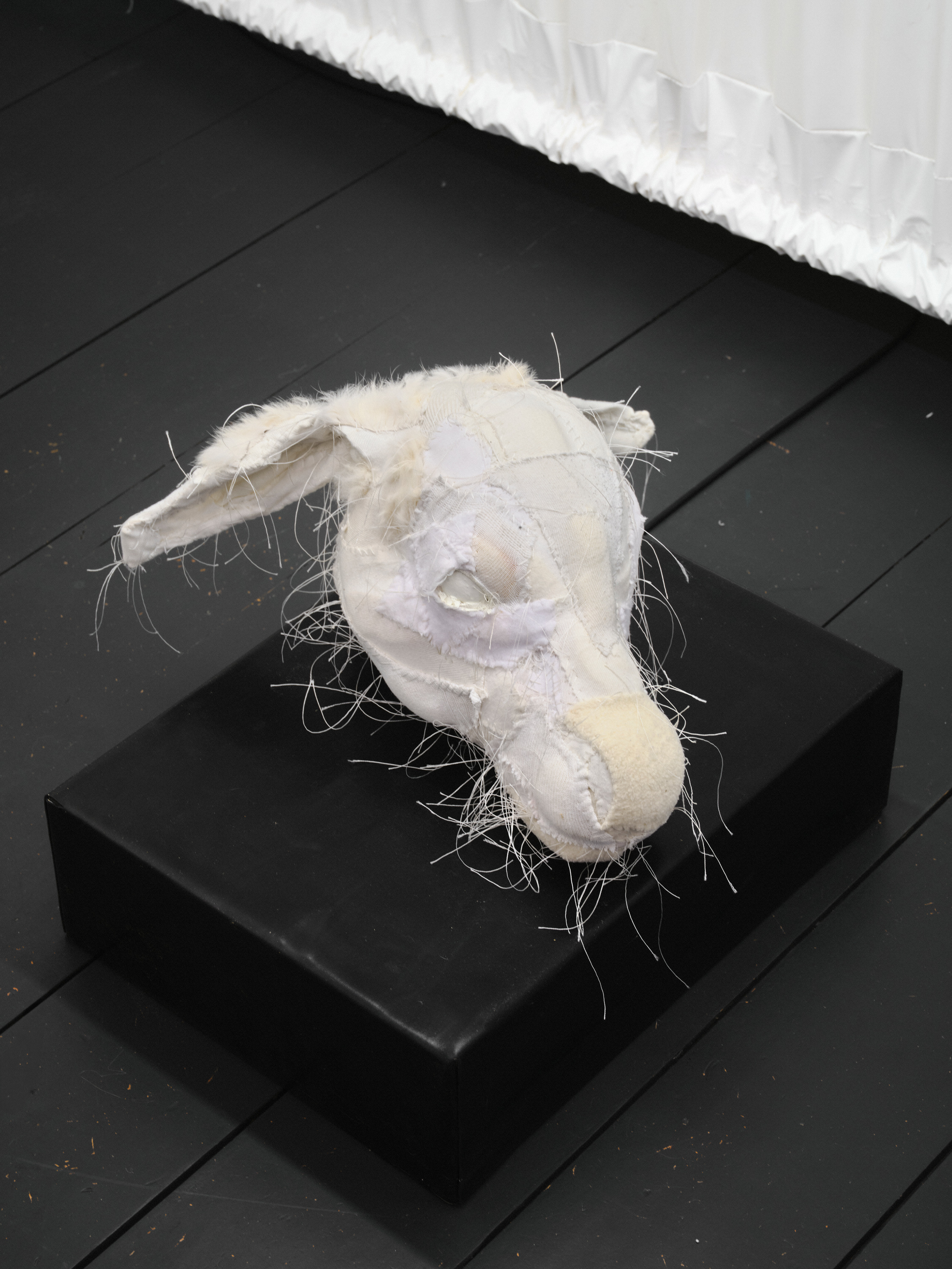 Flow My Tears (2026). Upholstery Foam, Cotton, Acrylic, Polyester, Polyester Thread, Epoxy Resin, Rabbit Fur. 22 x 41 x 18 cm. Sound Concept: Klaudia Hartung-Wójciak, Performance: Małgorzata Biela.