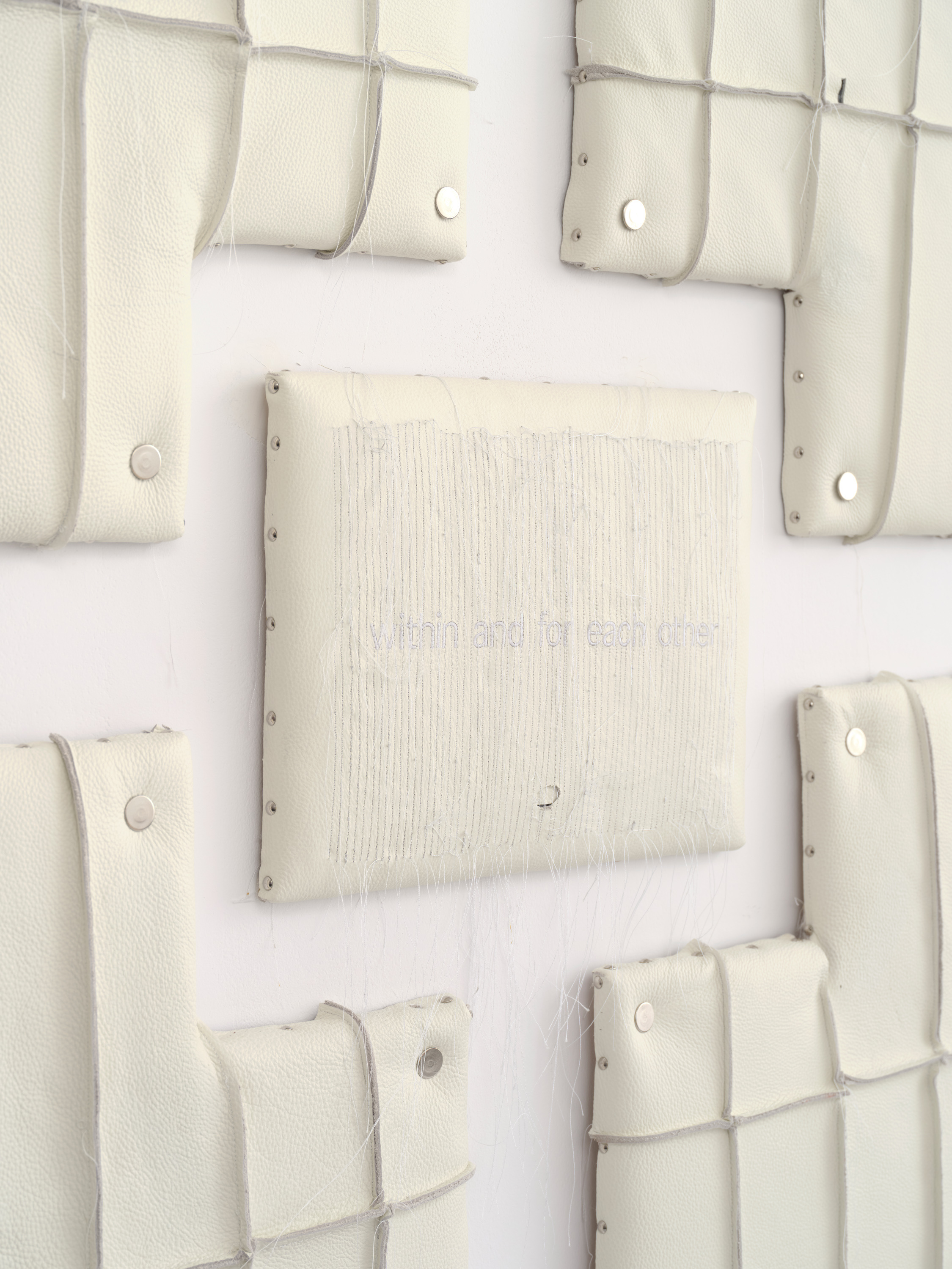 Relief 01 (2026). Powder-Coated Steel, Recycled Leather, White Lacquer. 10 x 10 x 70 cm.