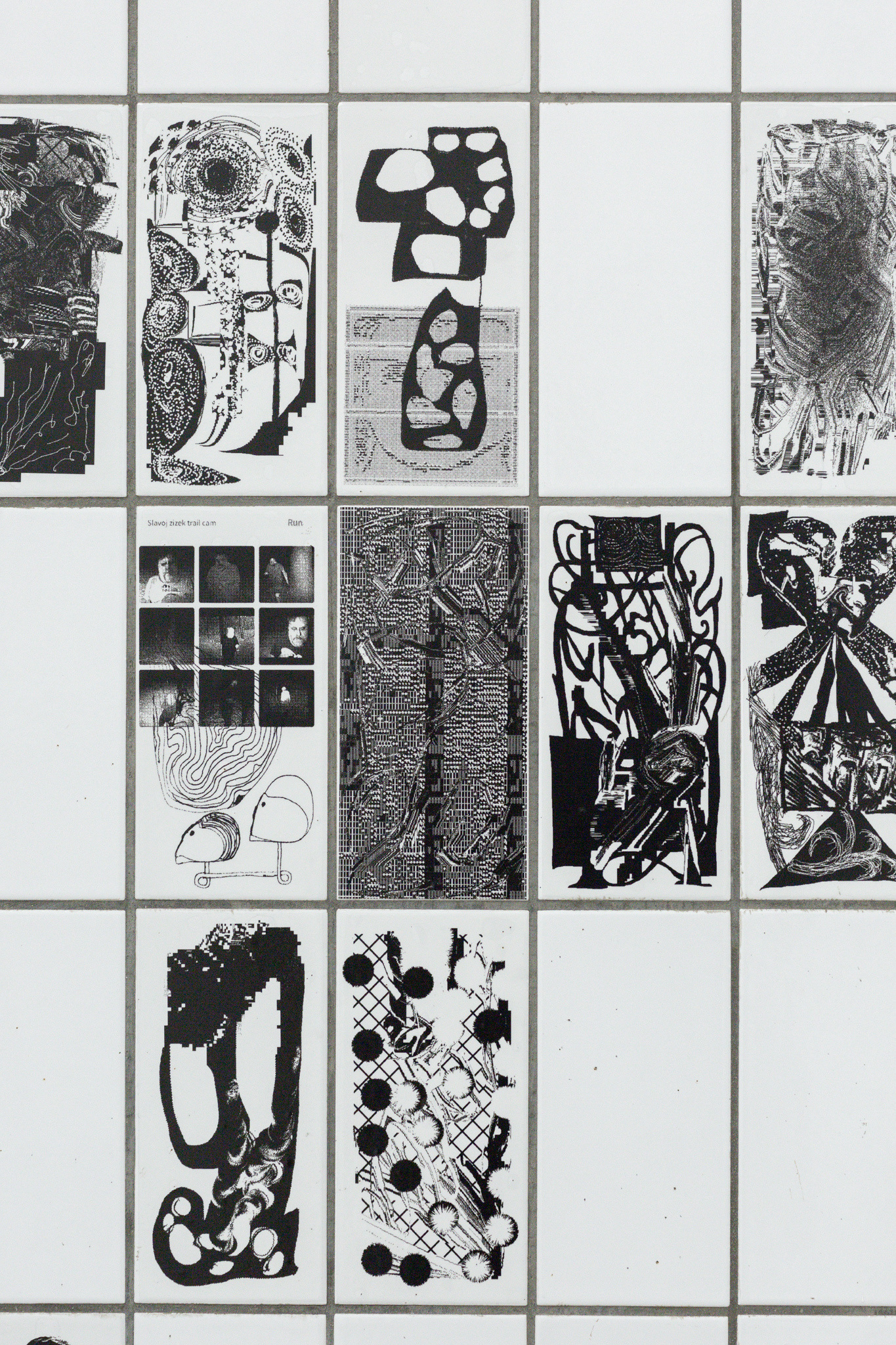 Jaakko Pallasvuo: Eternal Return, 2026, installation, dimension variable, bespoke paint software, 350 digital images reproduced as transparent stickers, three ceramic masks, red glaze