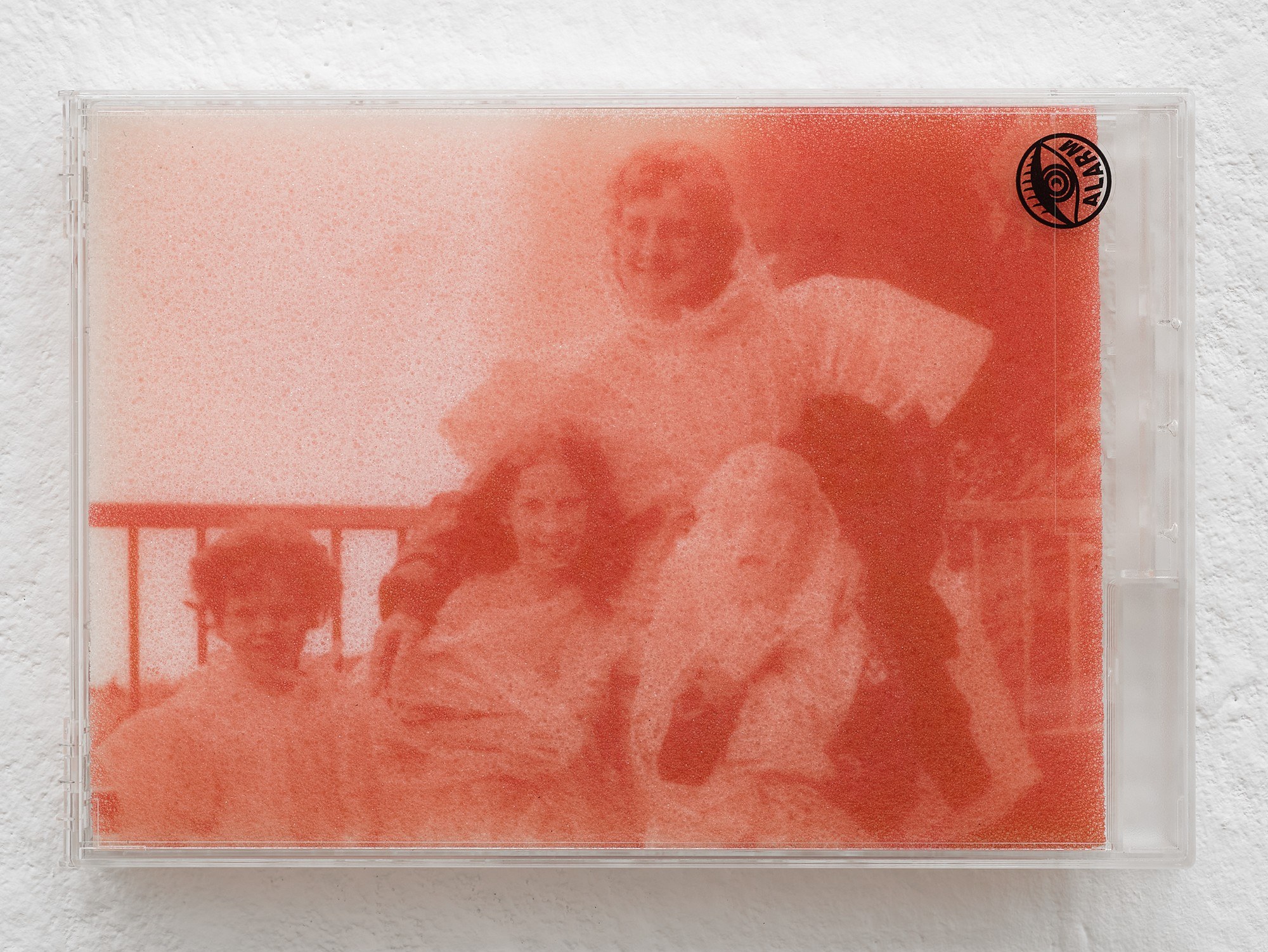 Billie Clarken, Sparks Fly (Chewing Tongue Series), 2024, UV print on foam, locked acrylic DVD security box, 14.8 × 21.5 × 2.2 cm © the artist and Galerie Brugger Photo: Juri Löchte