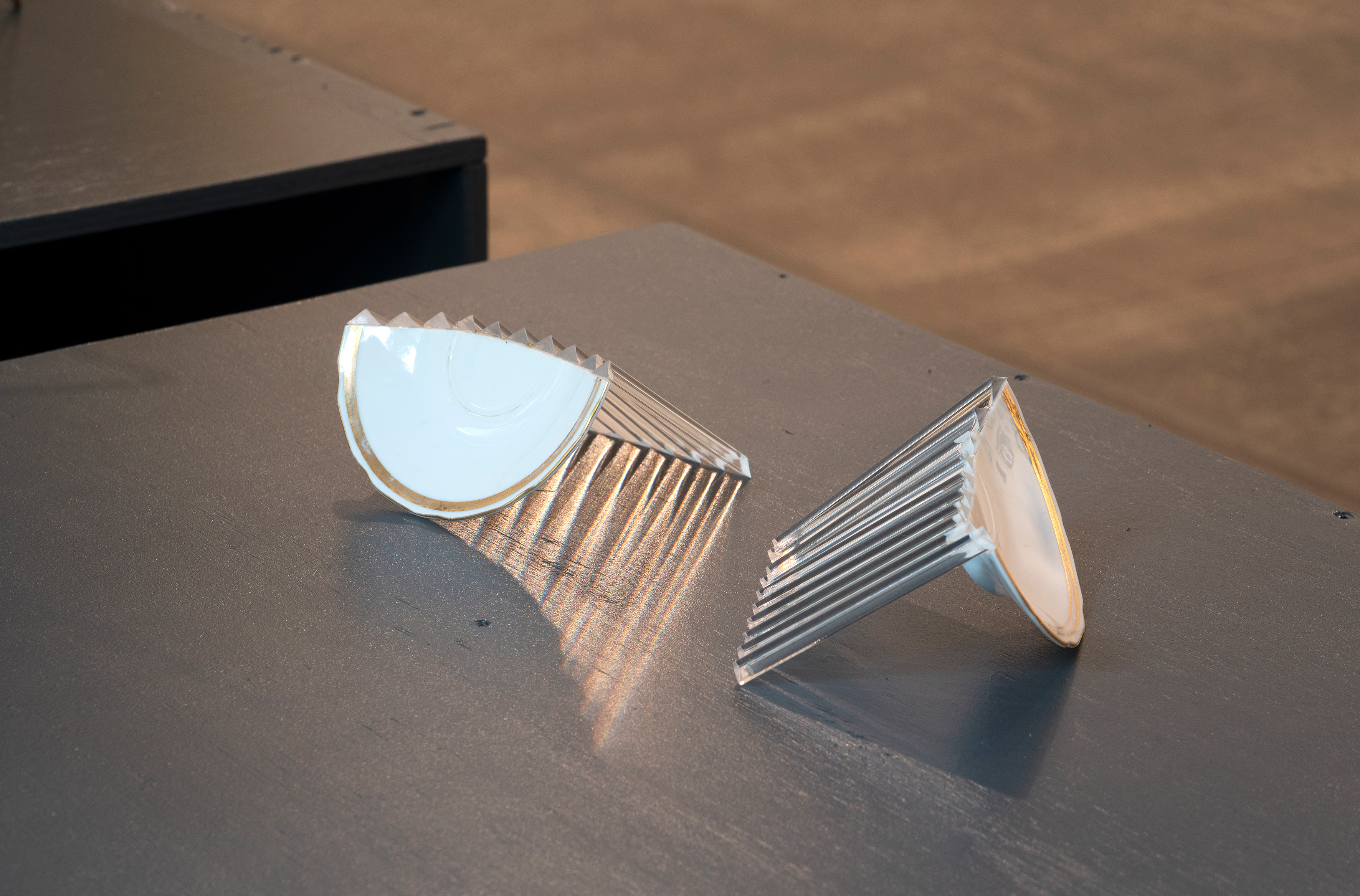 Pavla Sceranková, Crack, 2026, ceramics, plexiglas, 10 × 12 × 6 cm (2 pieces)