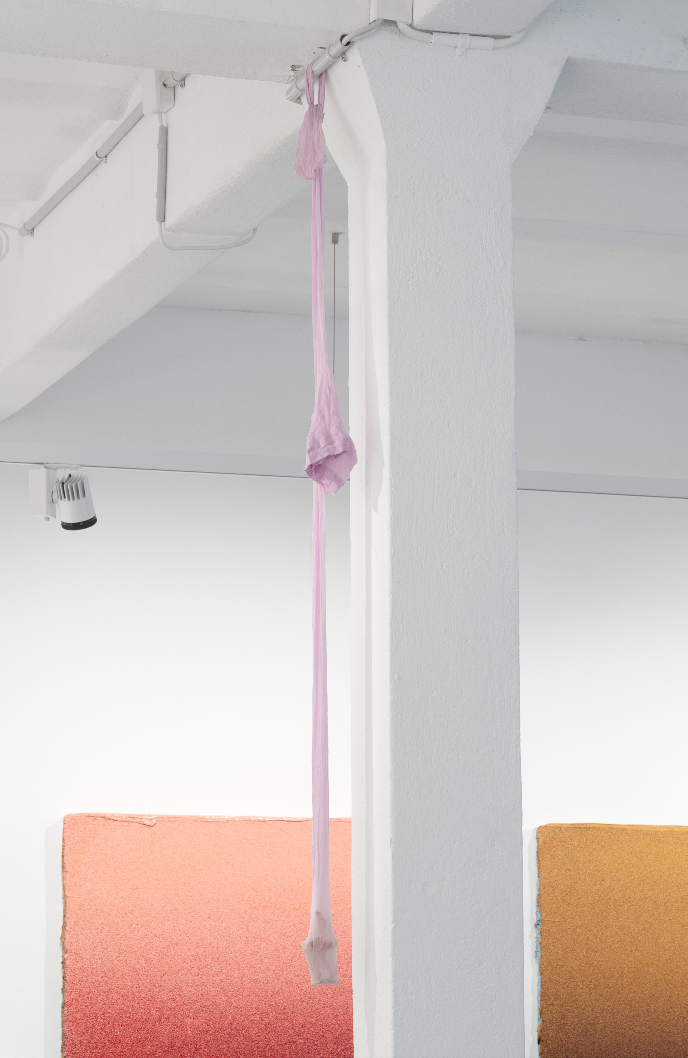 Pavla Sceranková, Star(r)ing, 2026, ceramic, stocking, 10 × 6 × 6 cm (variable)